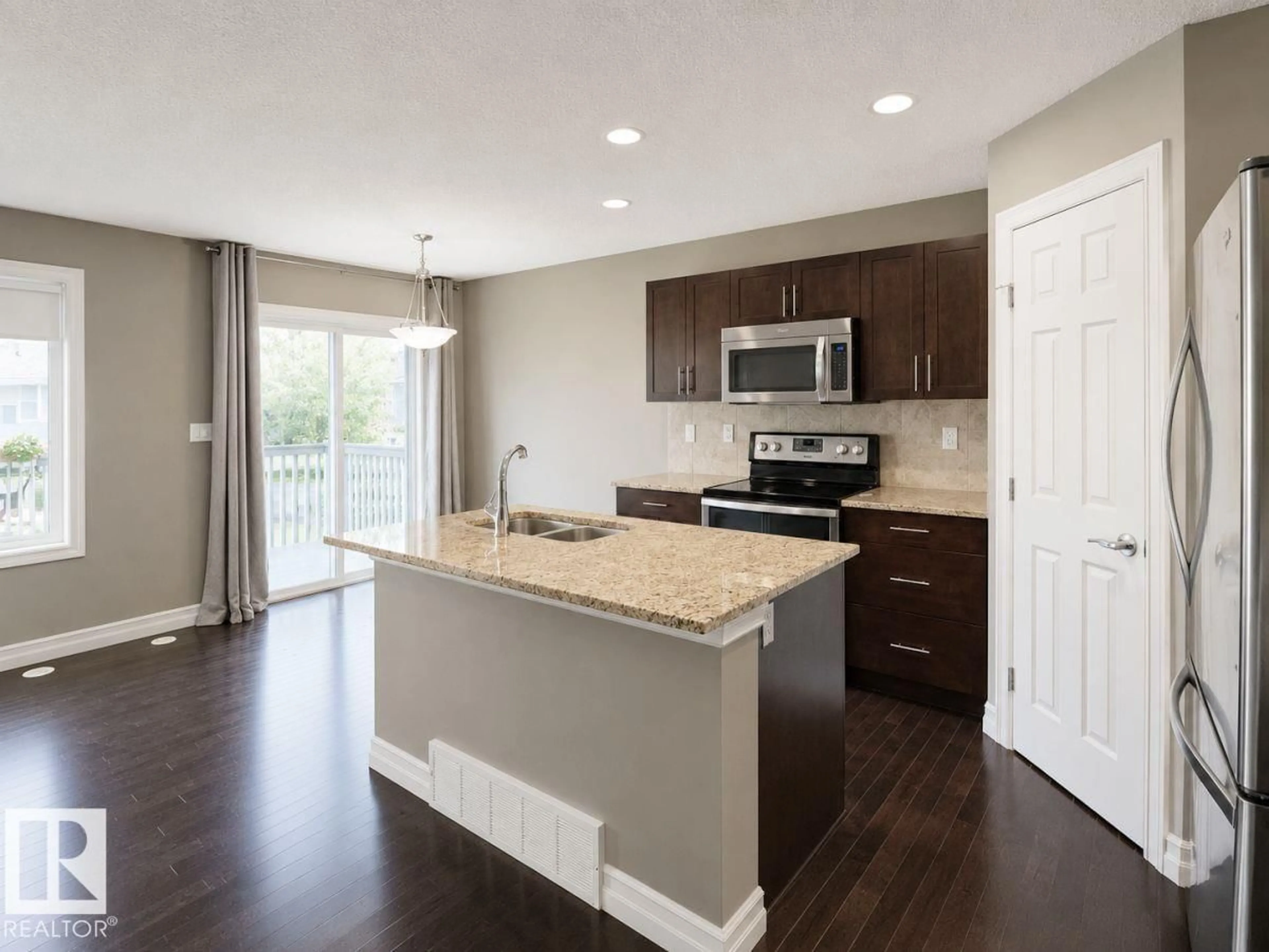 Open concept kitchen, unknown for 219 - 66 CHARLOTTE WY, Sherwood Park Alberta T8H0T3