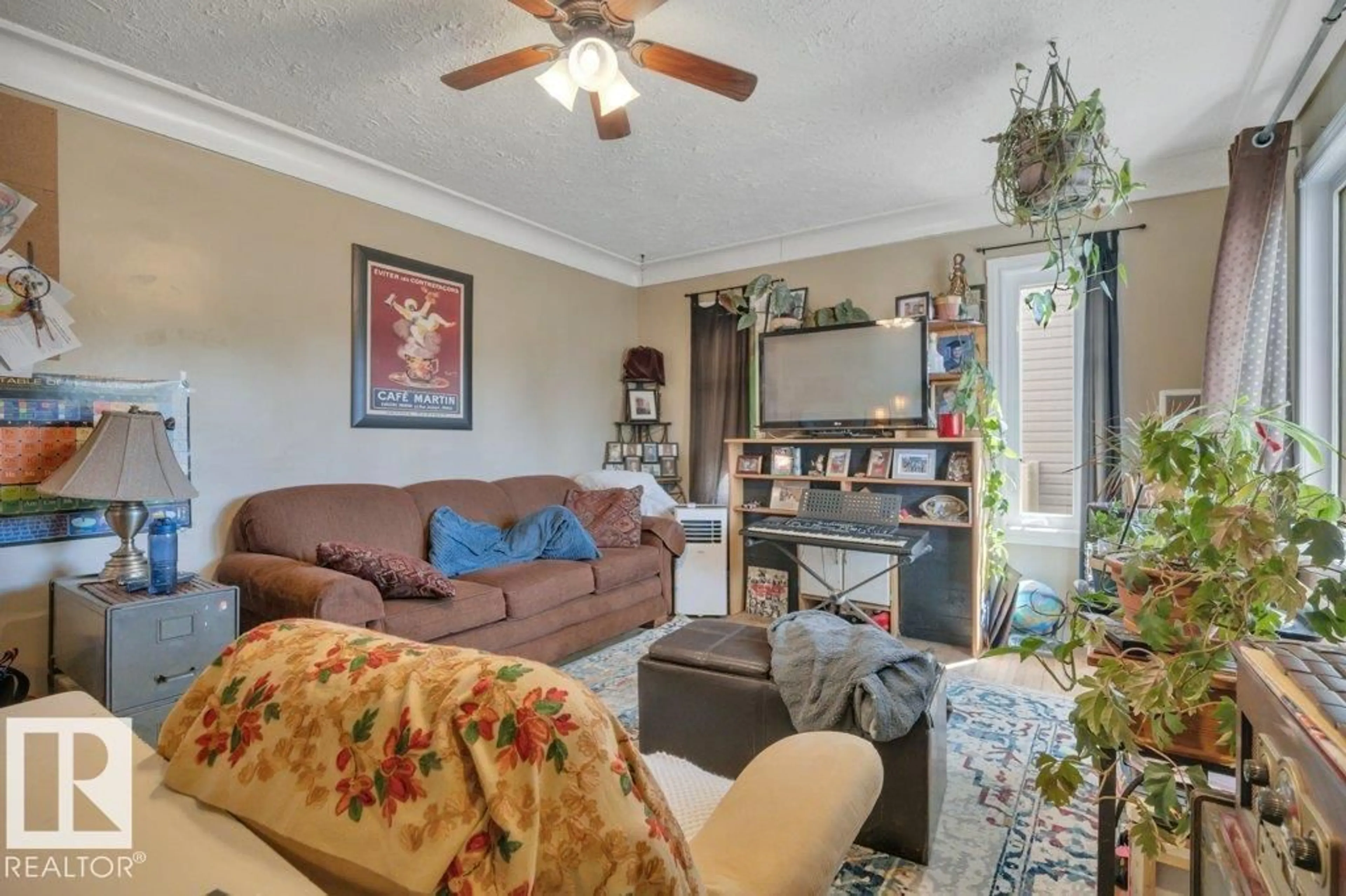 Living room with furniture, unknown for 12049 65 ST, Edmonton Alberta T5H2X6