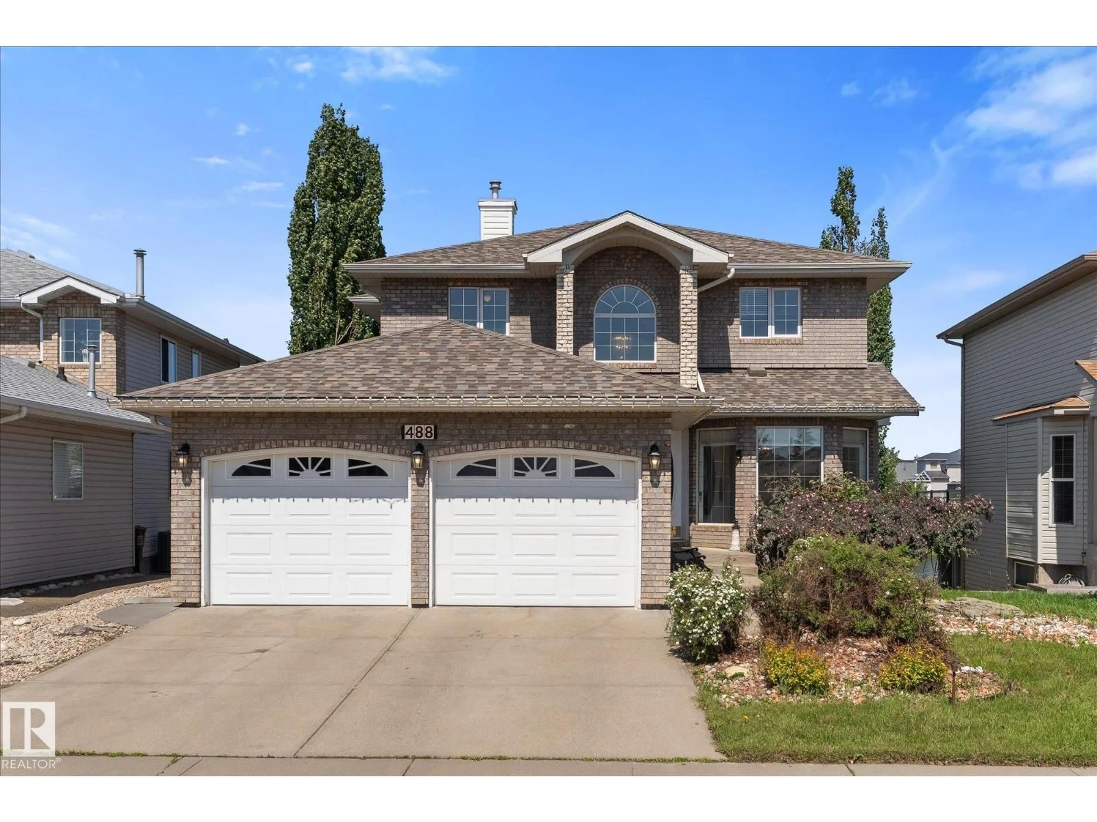 Home with vinyl exterior material, street for 488 KLARVATTEN LAKE WD, Edmonton Alberta T5Z3G7