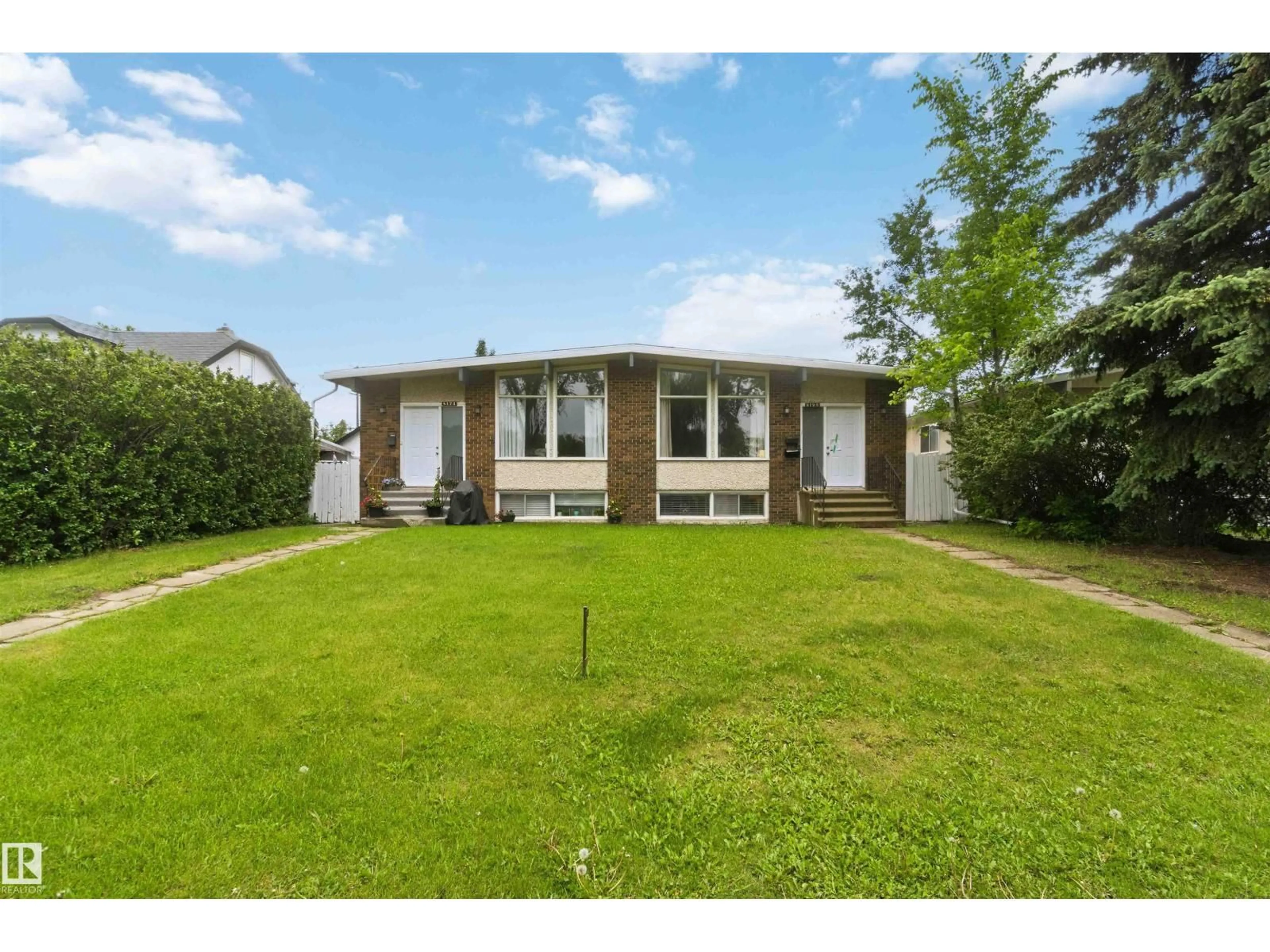 A pic from outside/outdoor area/front of a property/back of a property/a pic from drone, street for NW - 8123 8125 83 AV, Edmonton Alberta T6C1A7