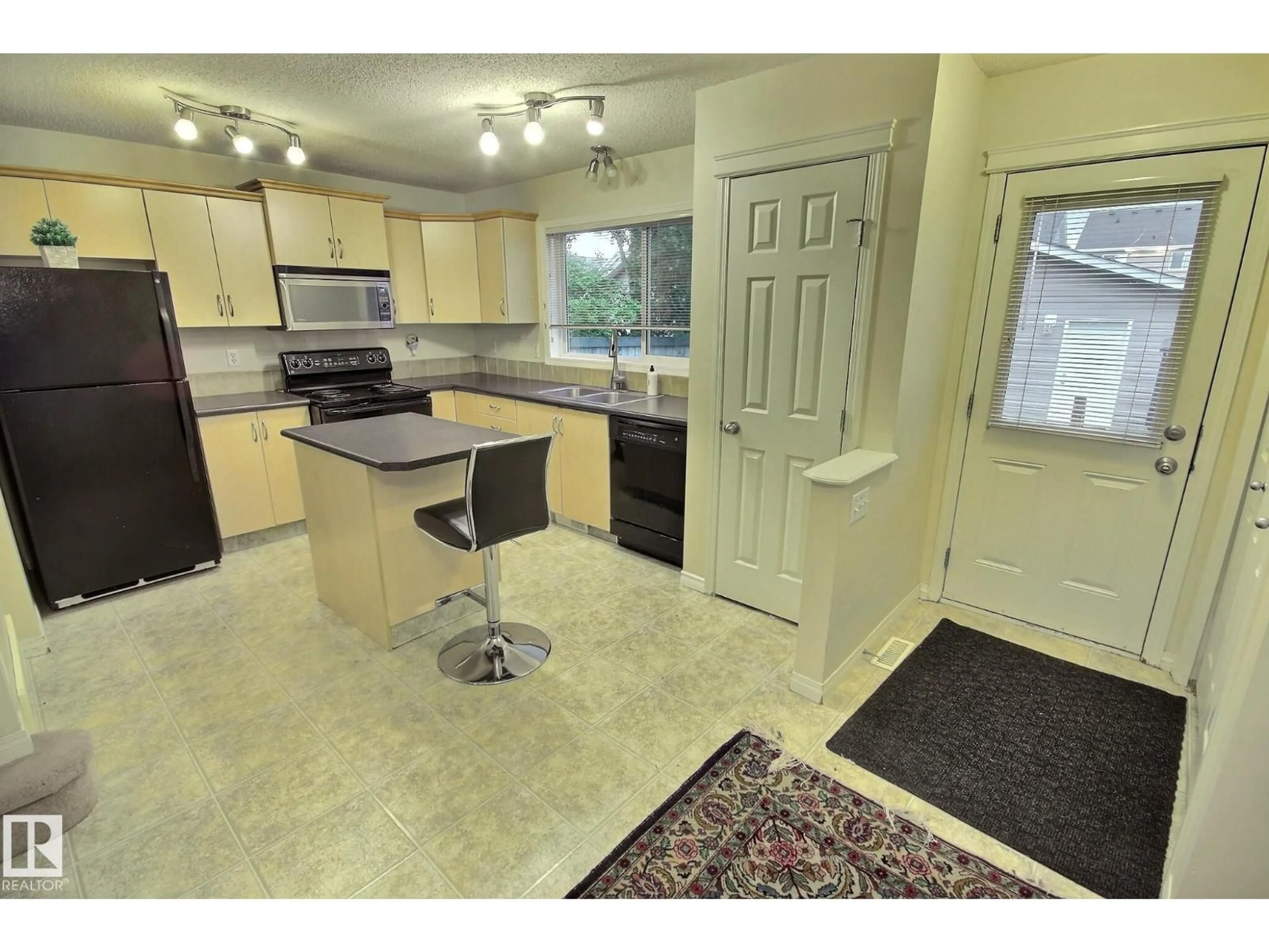 Open concept kitchen, unknown for 1516 76 ST, Edmonton Alberta T6X1M3