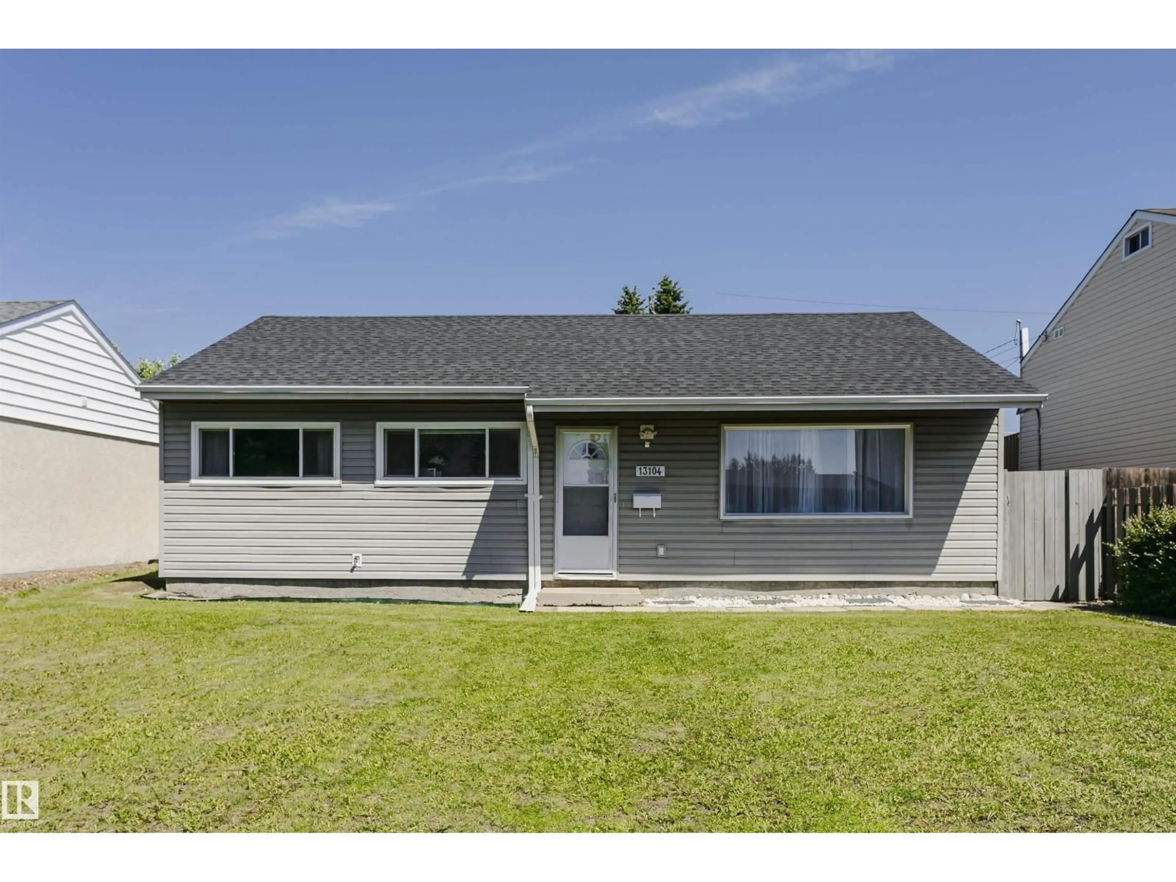 Home with vinyl exterior material, unknown for 13104 128 AV, Edmonton Alberta T5L3H2