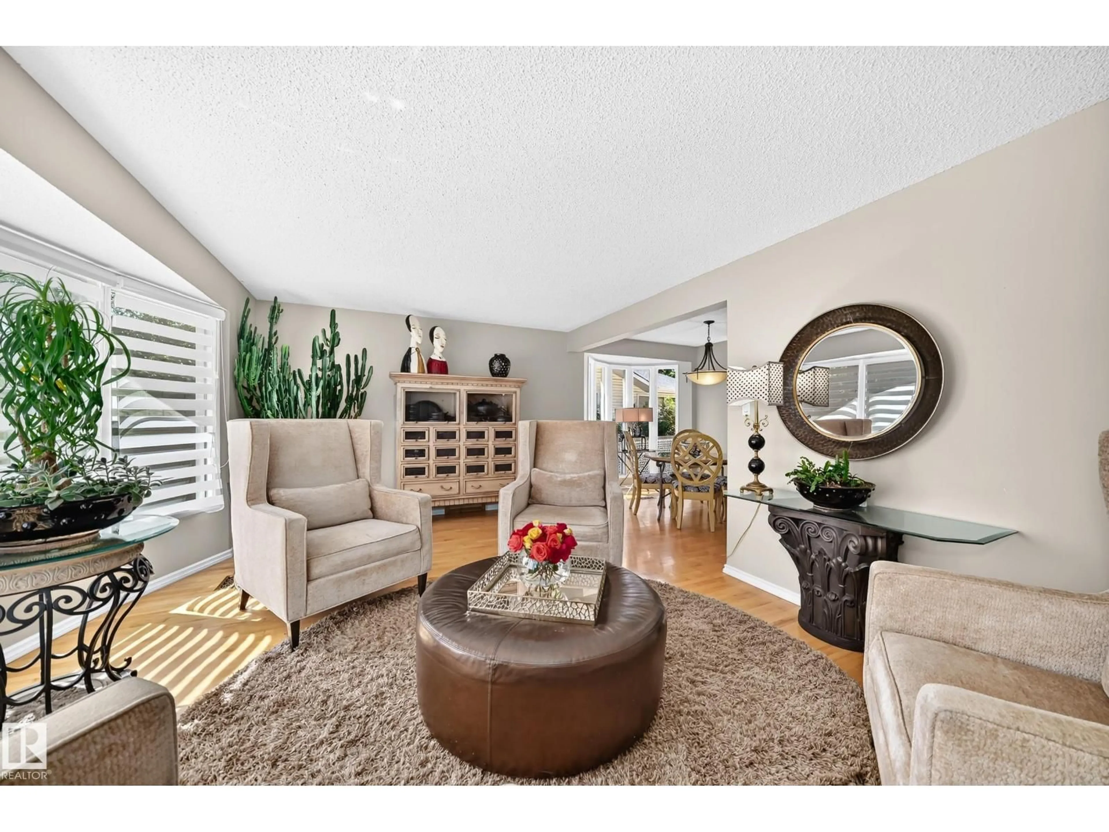 Living room with furniture, wood/laminate floor for 16024 78 AV, Edmonton Alberta T5R3E4