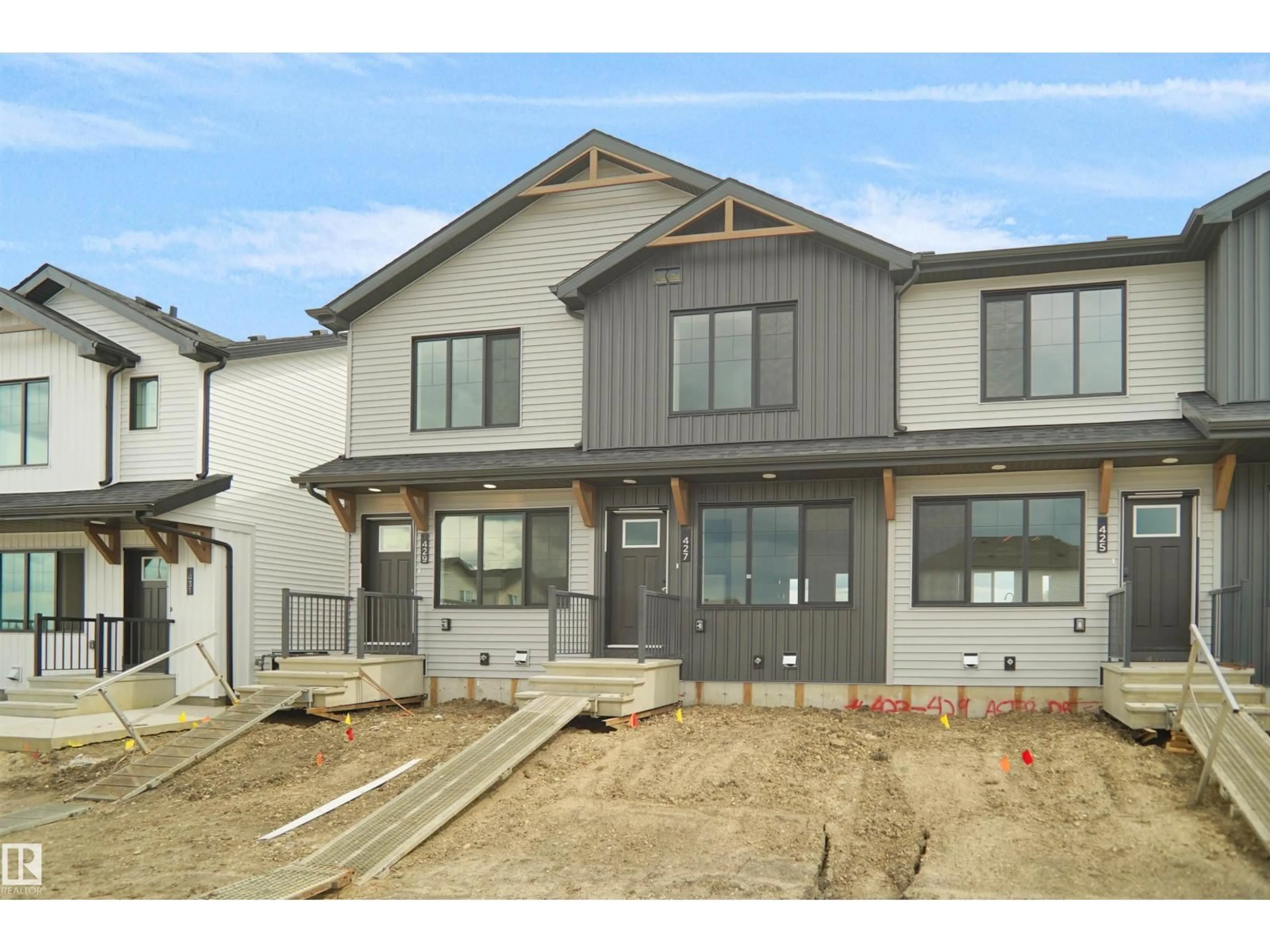 Home with brick exterior material, street for 427 ASTER DR, Edmonton Alberta T6T2N8