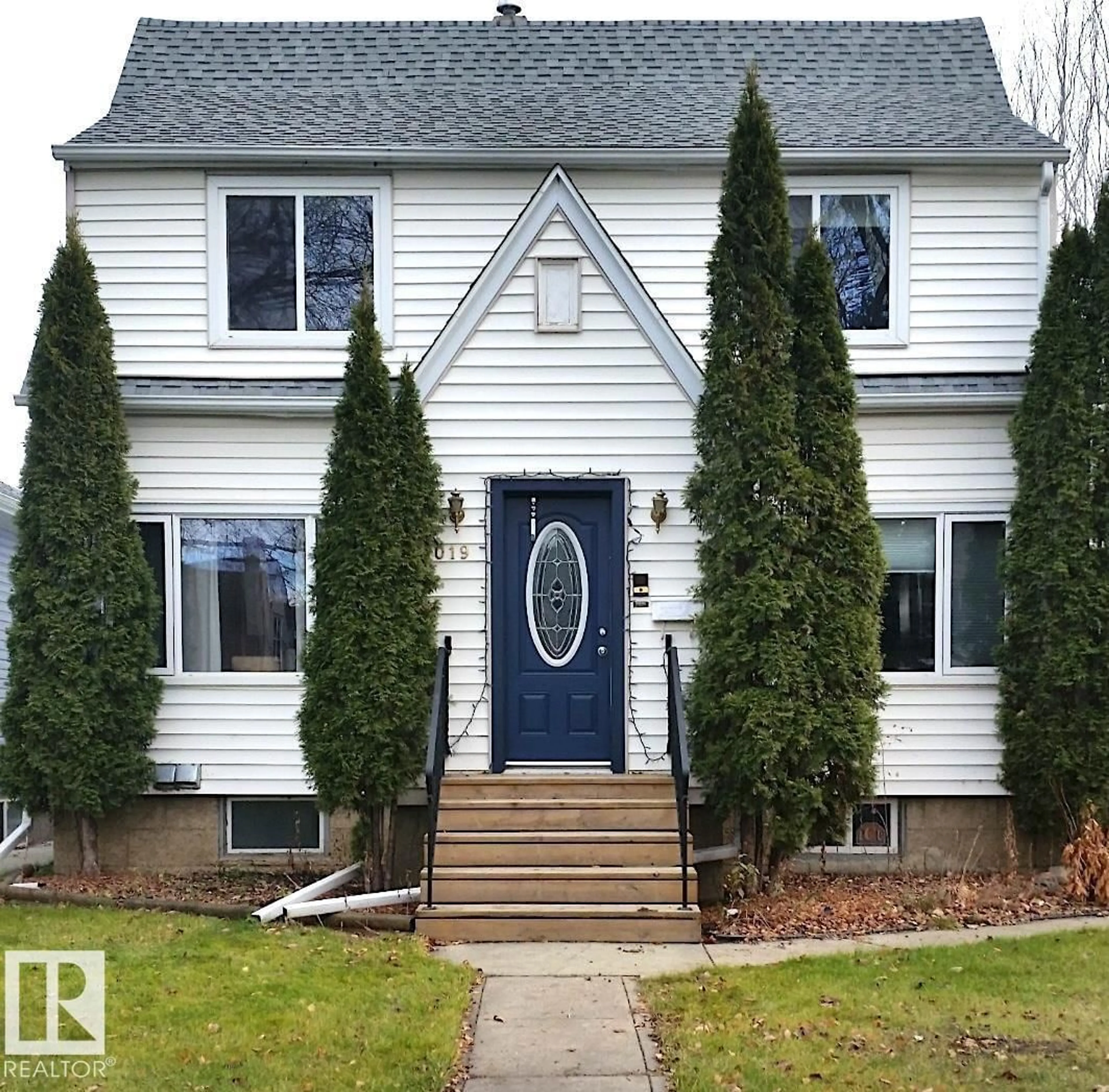 Home with vinyl exterior material, street for NW - 11019 126 ST, Edmonton Alberta T5M0P8