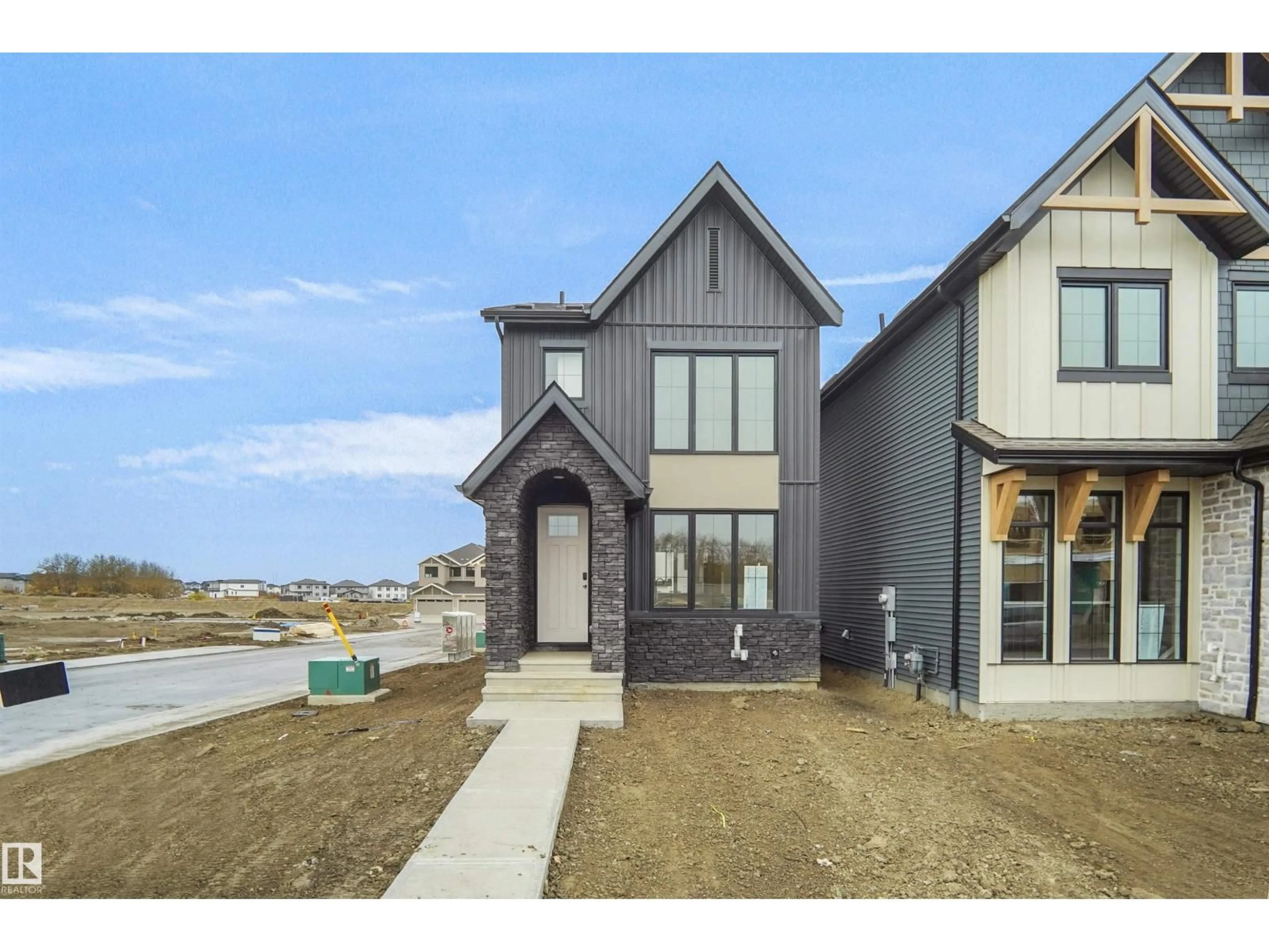 Home with brick exterior material, street for 1308 9 ST, Edmonton Alberta T6T2W2