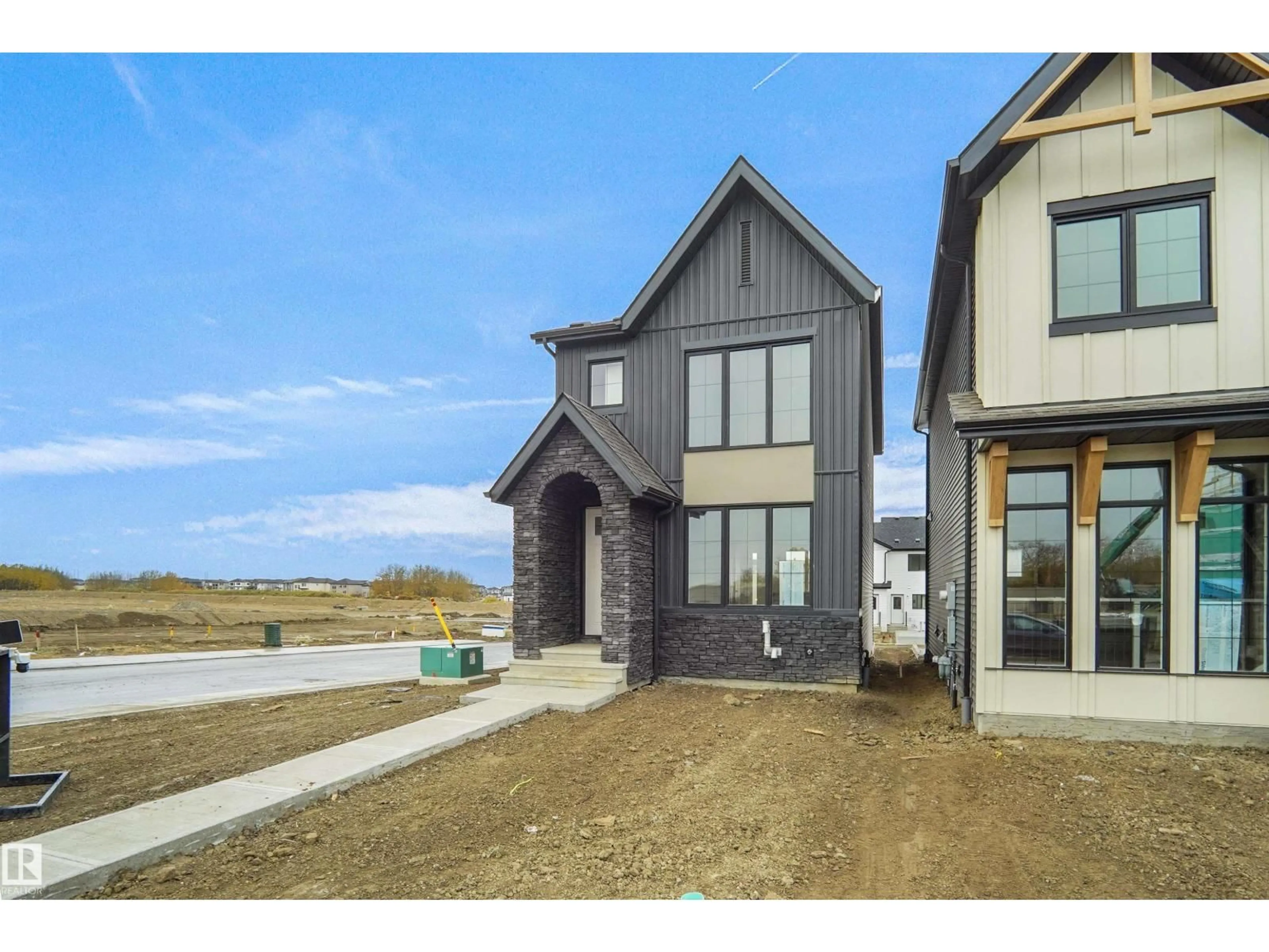 Home with brick exterior material, street for 1308 9 ST, Edmonton Alberta T6T2W2