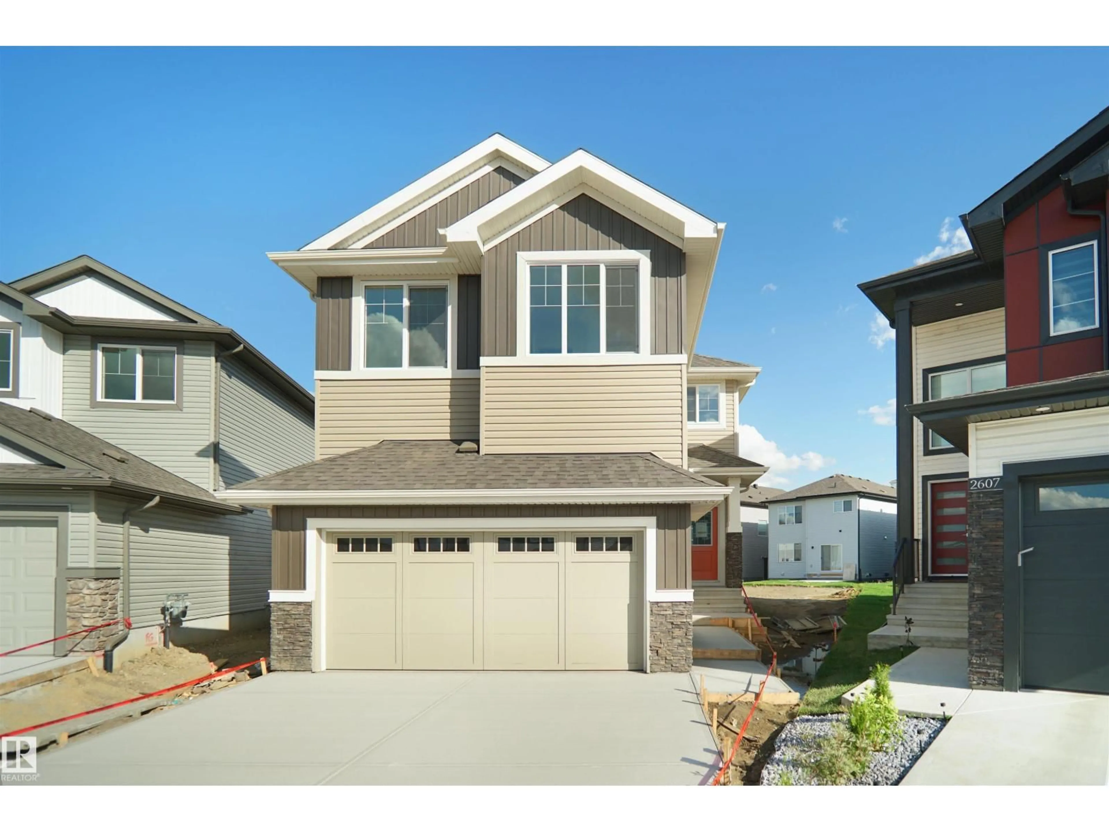 Home with vinyl exterior material, street for 2603 15 AV, Edmonton Alberta T6T2N5