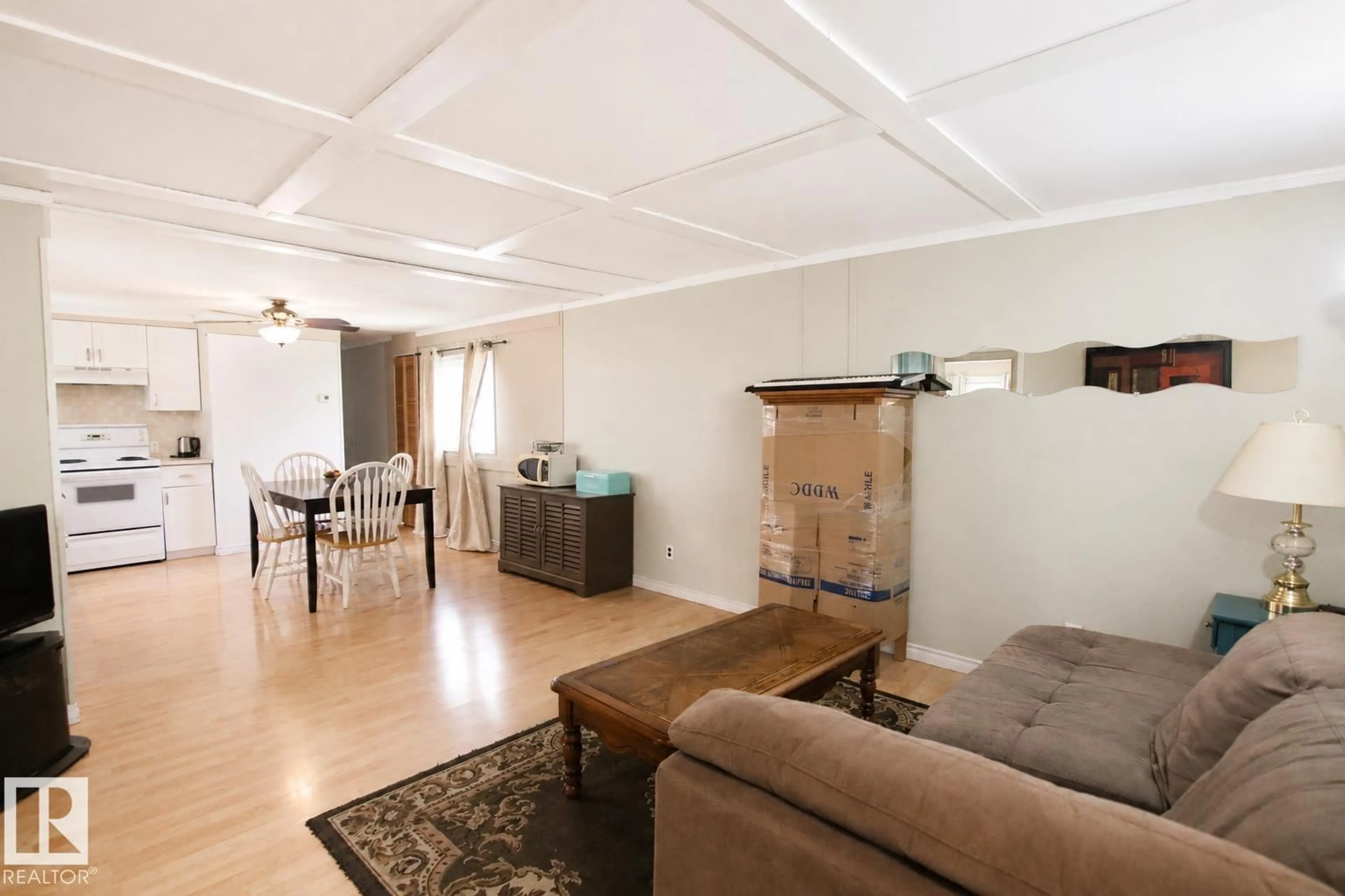 Living room with furniture, wood/laminate floor for 2415 OAK WAY, Edmonton Alberta T5S1T7