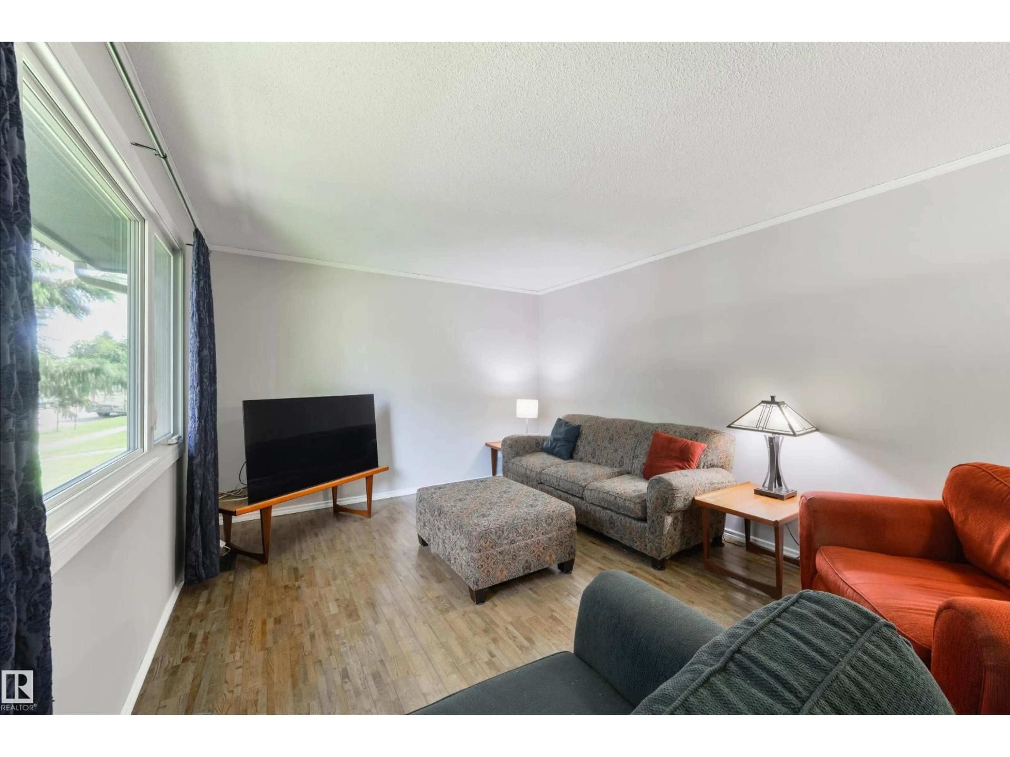 Living room with furniture, wood/laminate floor for 122 BROOKWOOD DR, Spruce Grove Alberta T7X1G7