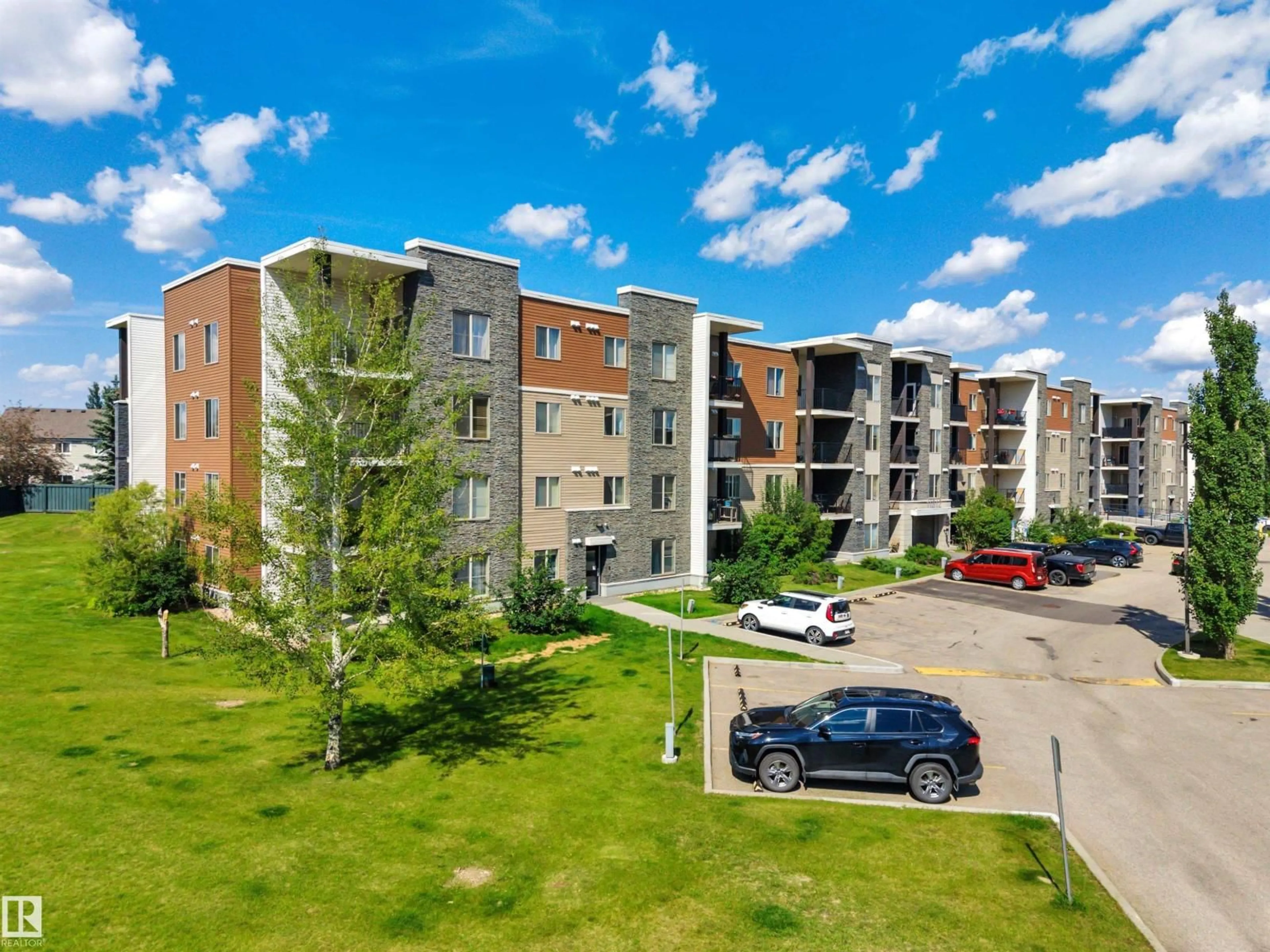 A pic from outside/outdoor area/front of a property/back of a property/a pic from drone, building for #402 - 11812 22 AV, Edmonton Alberta T6W2A2