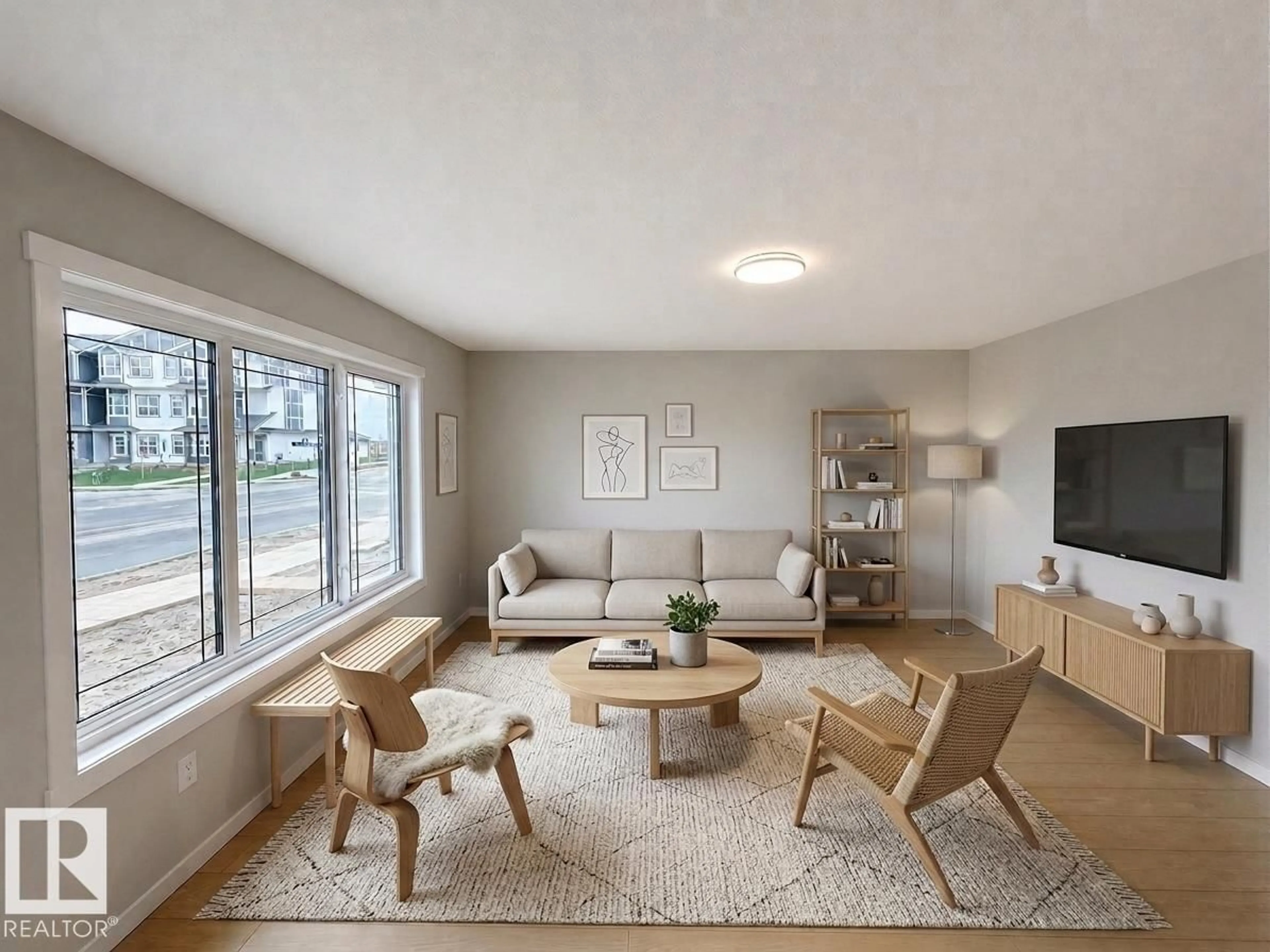 Living room with furniture, wood/laminate floor for 171 GRIESBACH RD, Edmonton Alberta T5E7A8