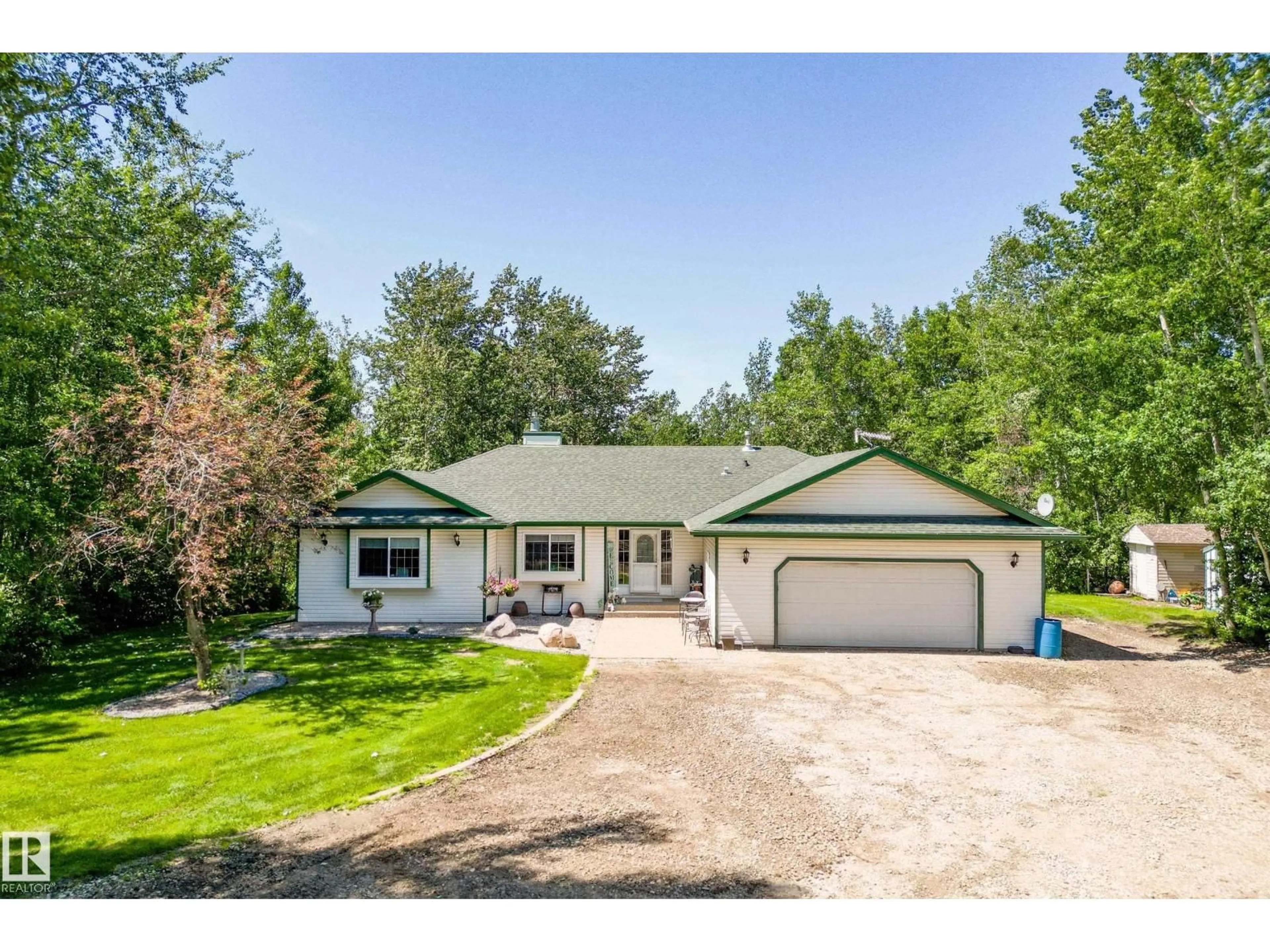 A pic from outside/outdoor area/front of a property/back of a property/a pic from drone, street for #2 - 27420 TWP ROAD 540, Rural Parkland County Alberta T7X3S7