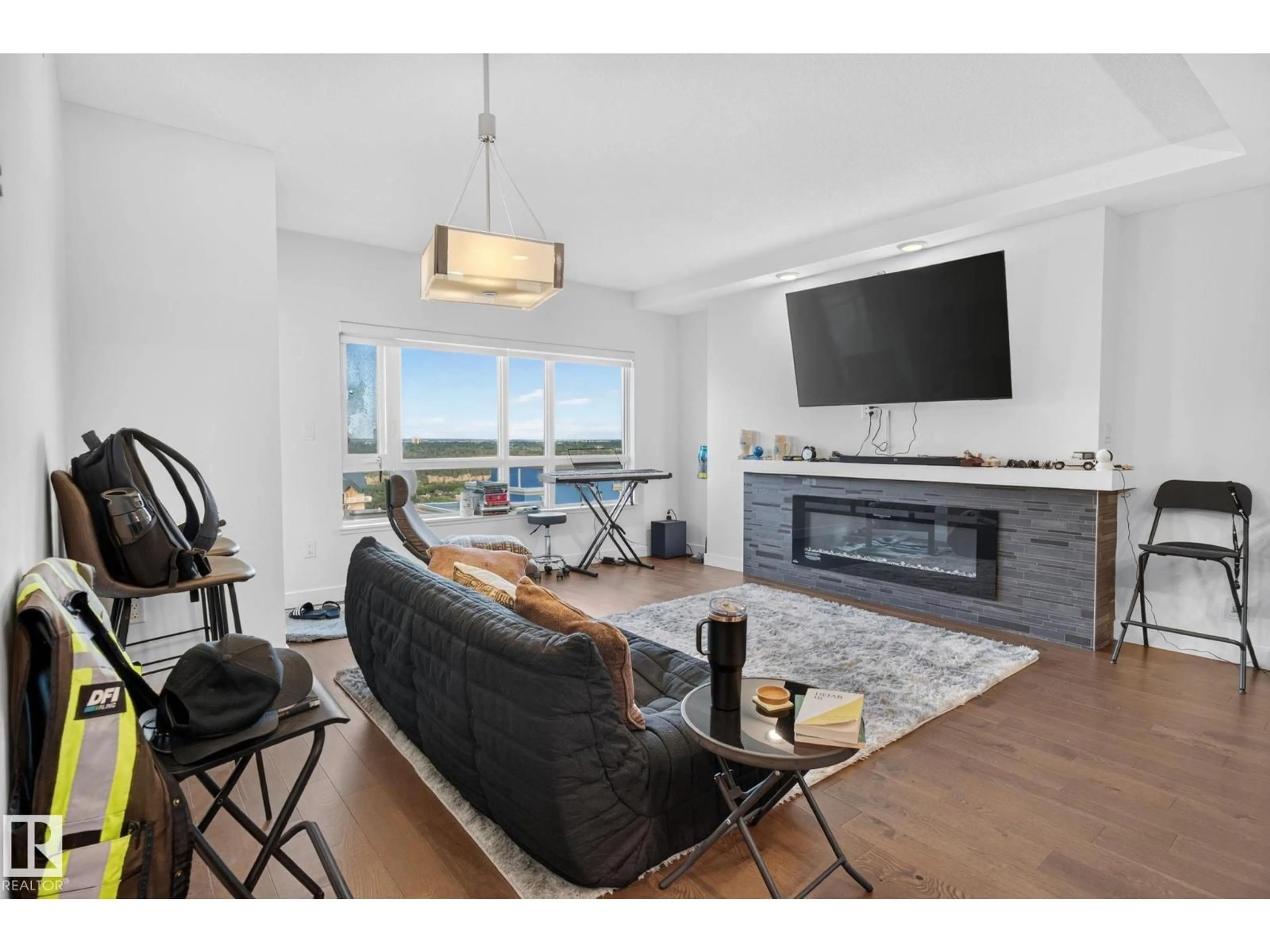 Living room with furniture, unknown for NW - 1504 106 ST, Edmonton Alberta T5K0K8