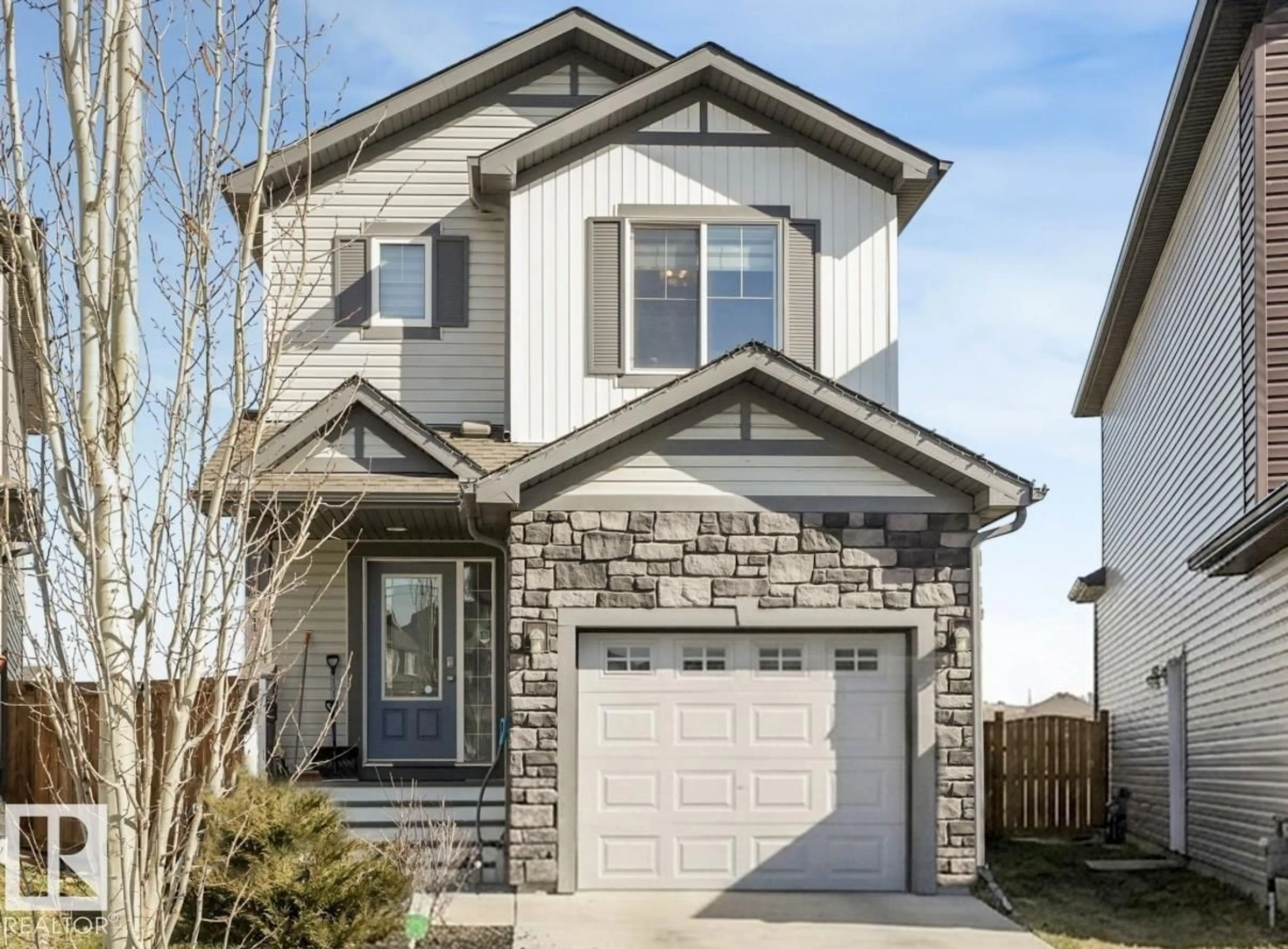Home with vinyl exterior material, street for NW - 17171 38 ST, Edmonton Alberta T5Y3R7