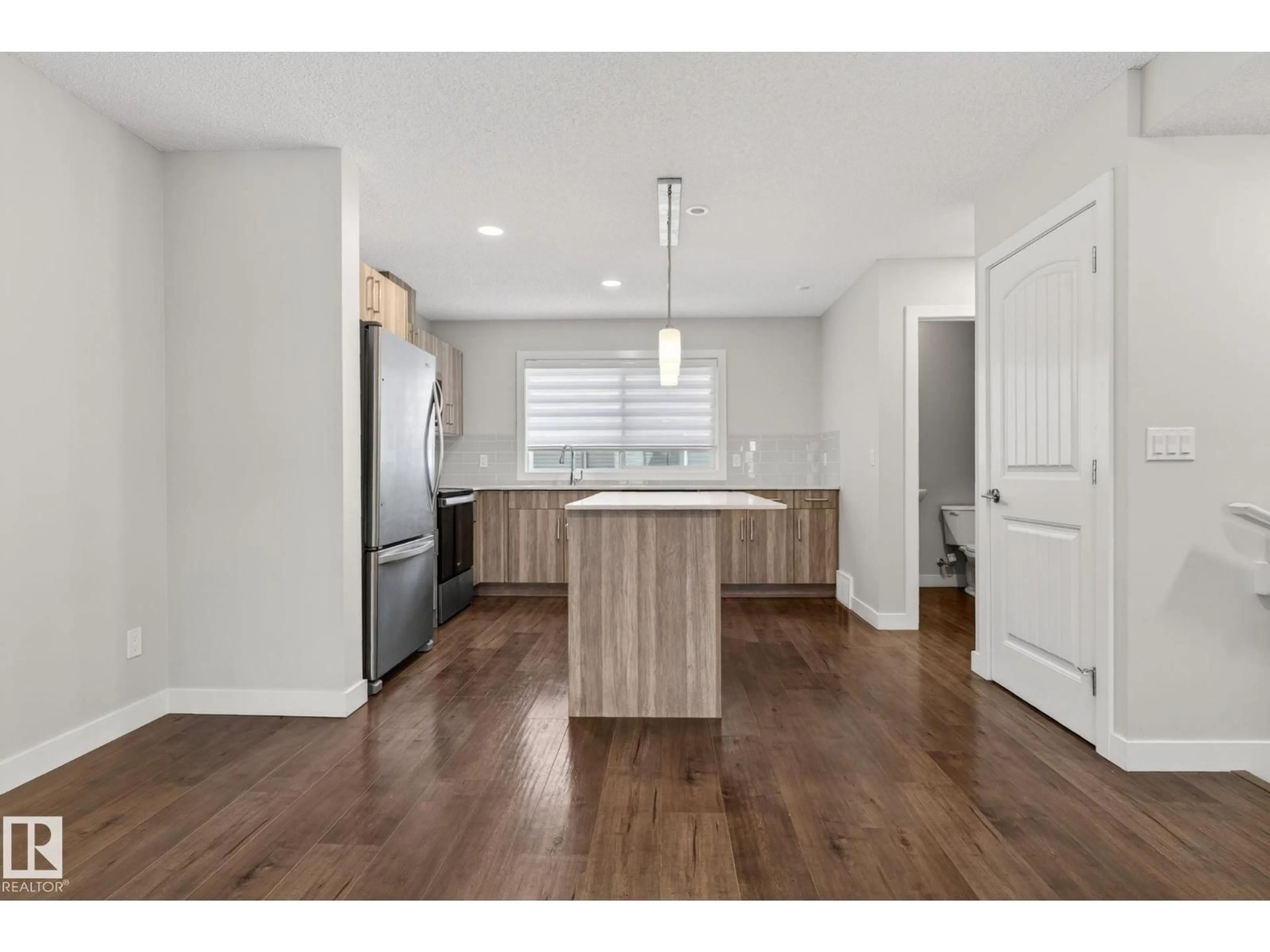Open concept kitchen, unknown for #35 - 3025 151 AV, Edmonton Alberta T5Y3W4