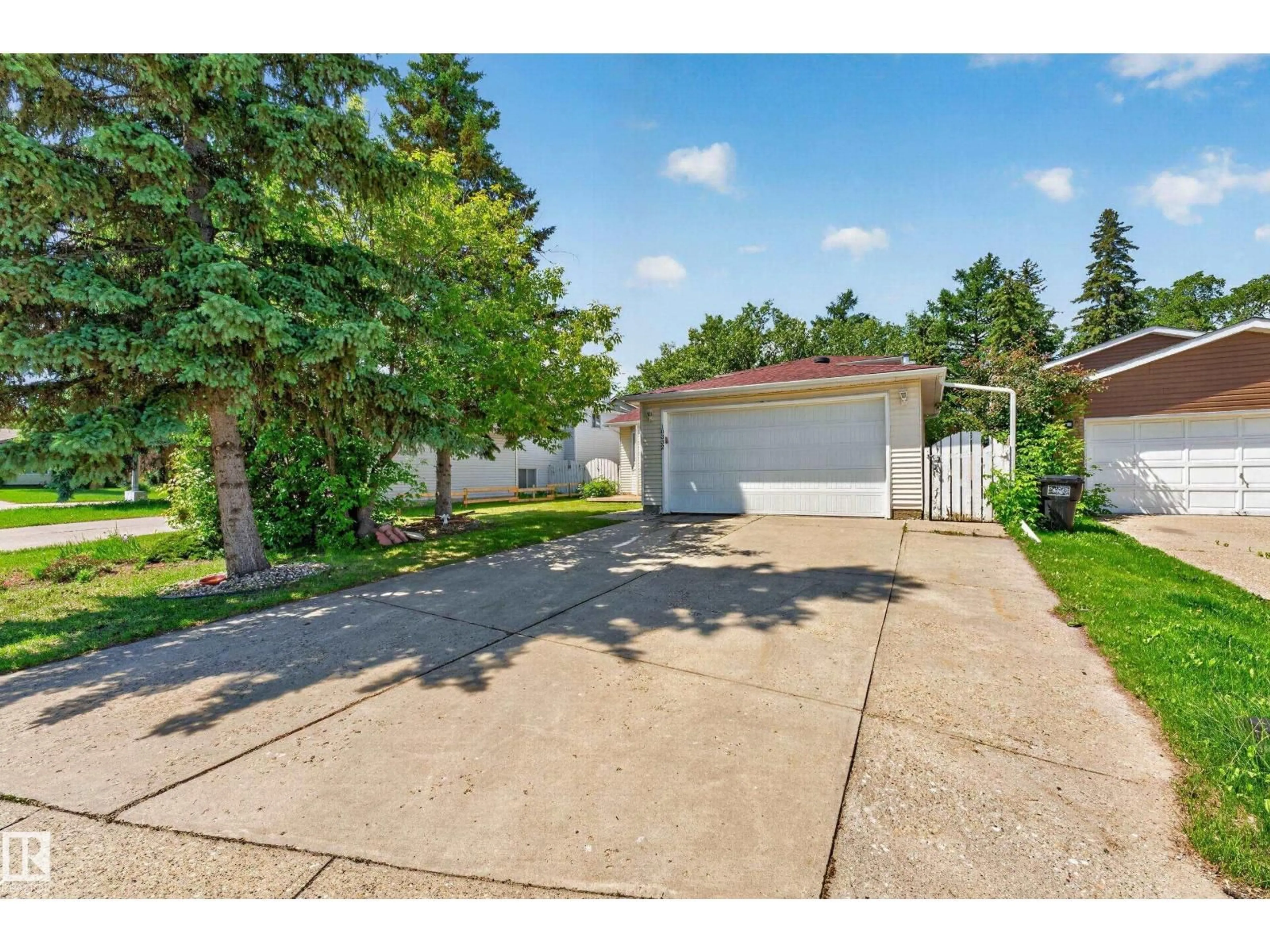 A pic from outside/outdoor area/front of a property/back of a property/a pic from drone, street for 10332 21 AV, Edmonton Alberta T6J6B6