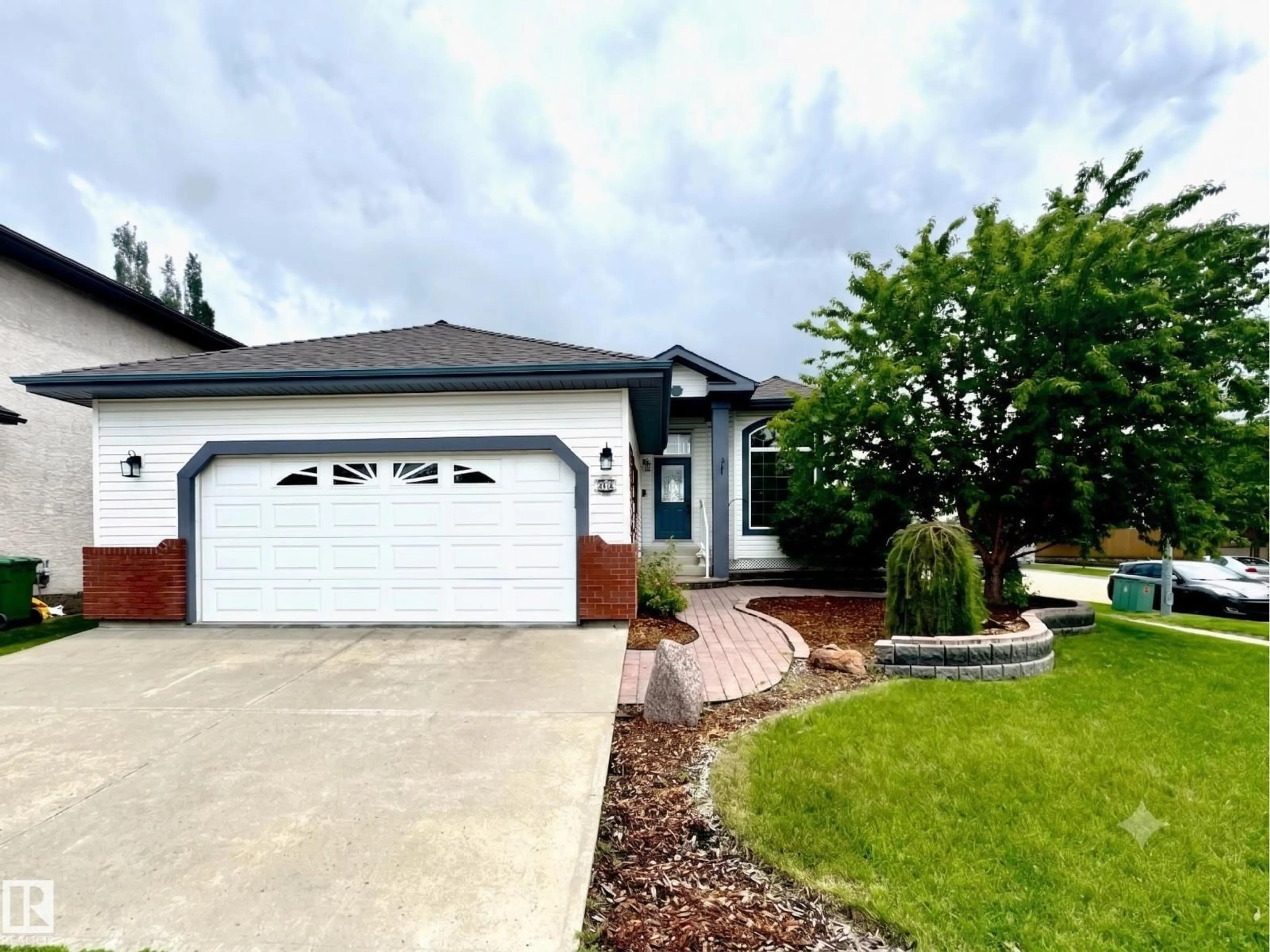 Home with vinyl exterior material, street for 29 RUE BOUCHARD, Beaumont Alberta T4X1R5