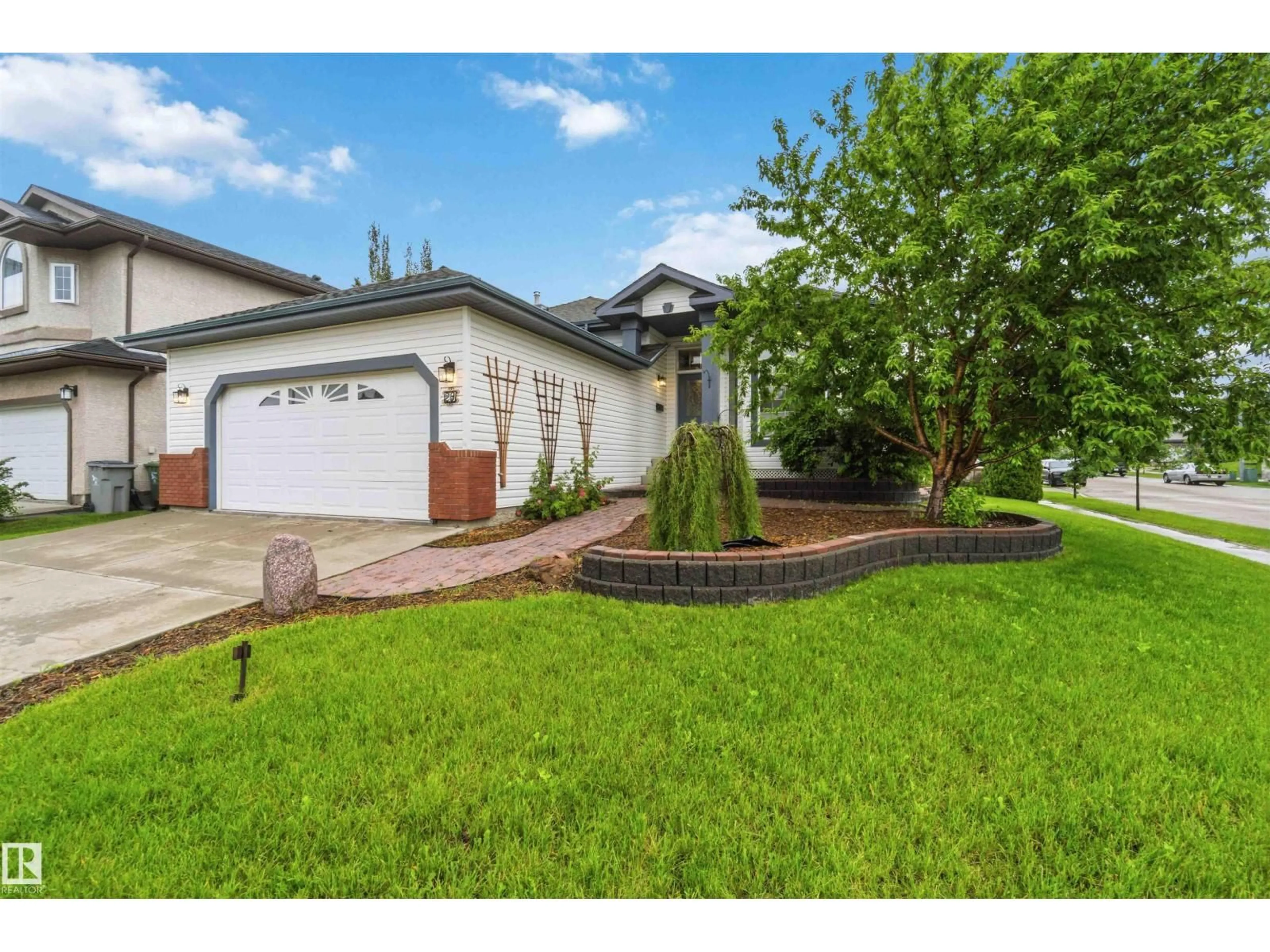 Home with vinyl exterior material, street for 29 RUE BOUCHARD, Beaumont Alberta T4X1R5