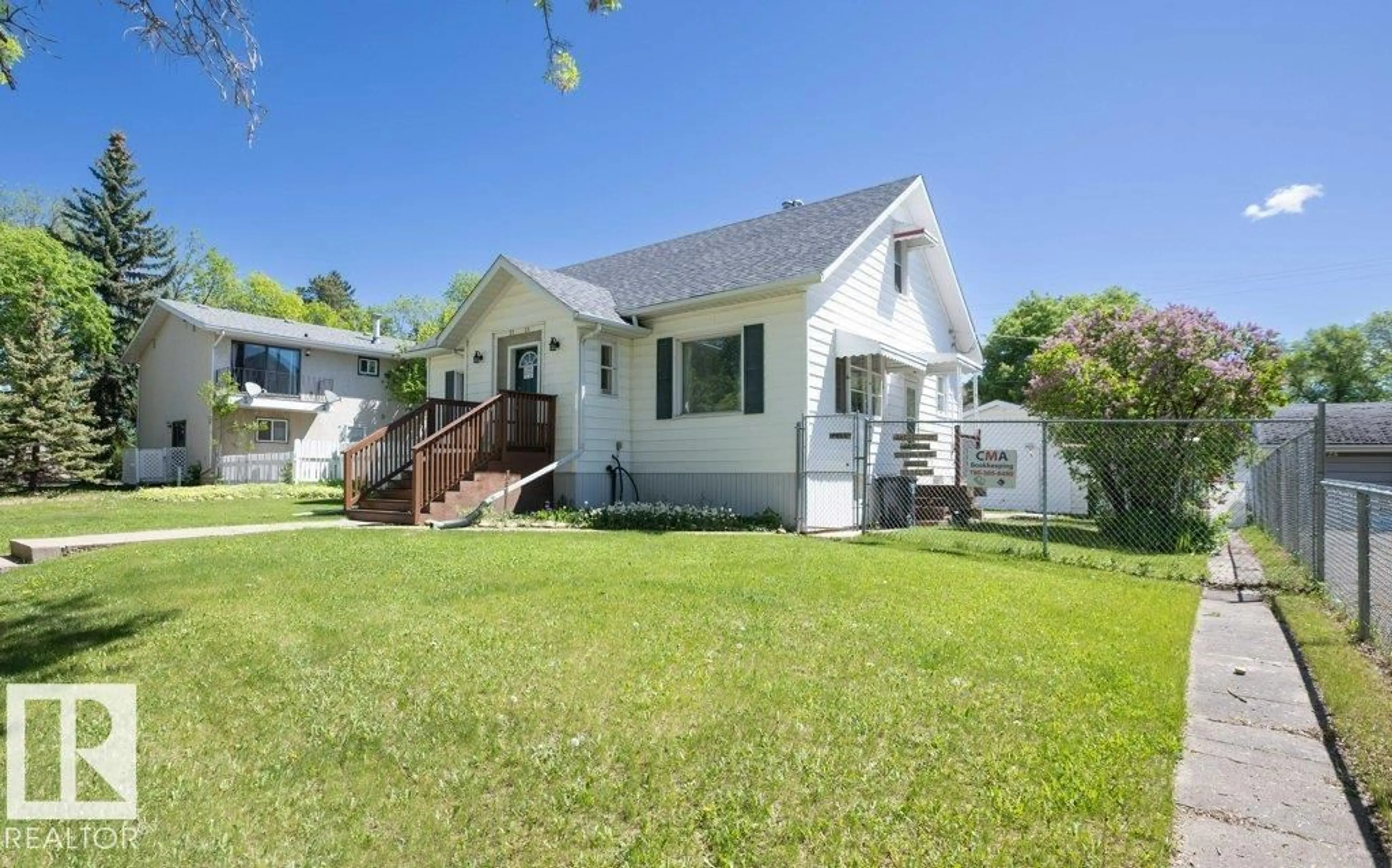 A pic from outside/outdoor area/front of a property/back of a property/a pic from drone, street for 5131 52 ST, Barrhead Alberta T7N1E9