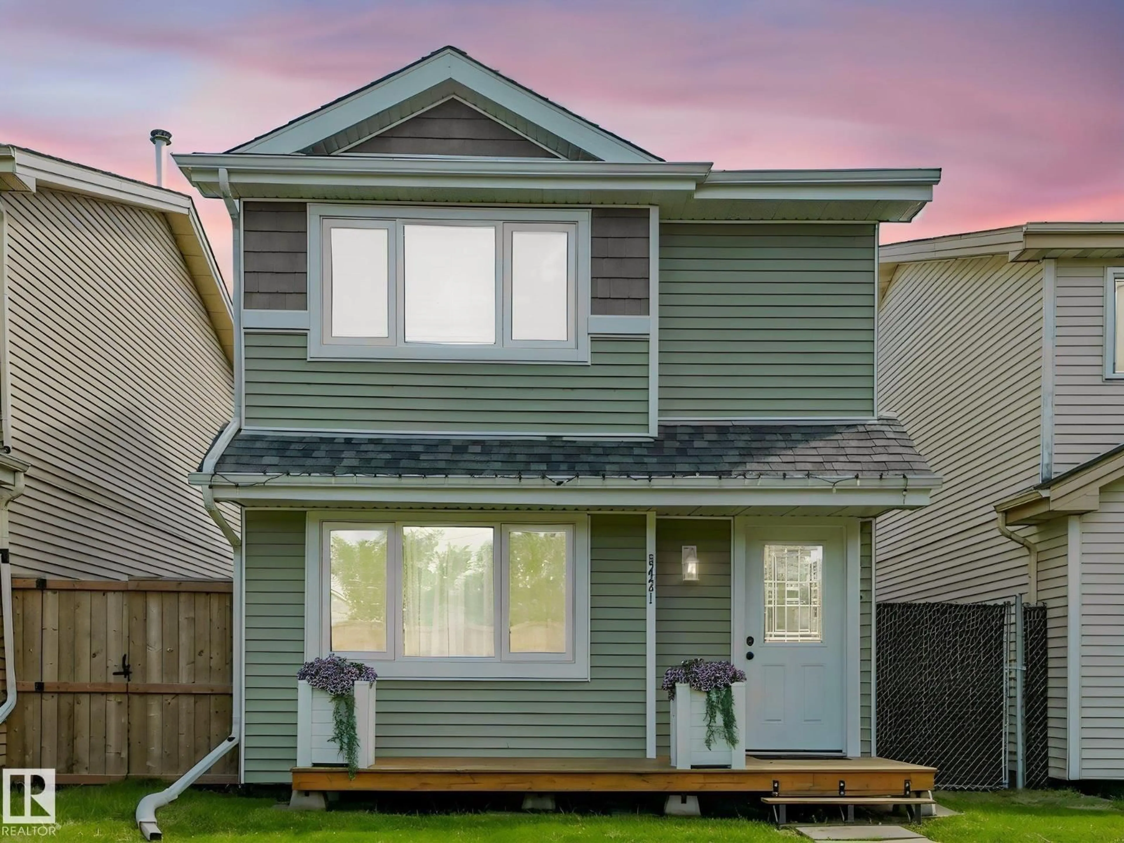 Home with vinyl exterior material, street for 5421 22 AV, Edmonton Alberta T6L4V1