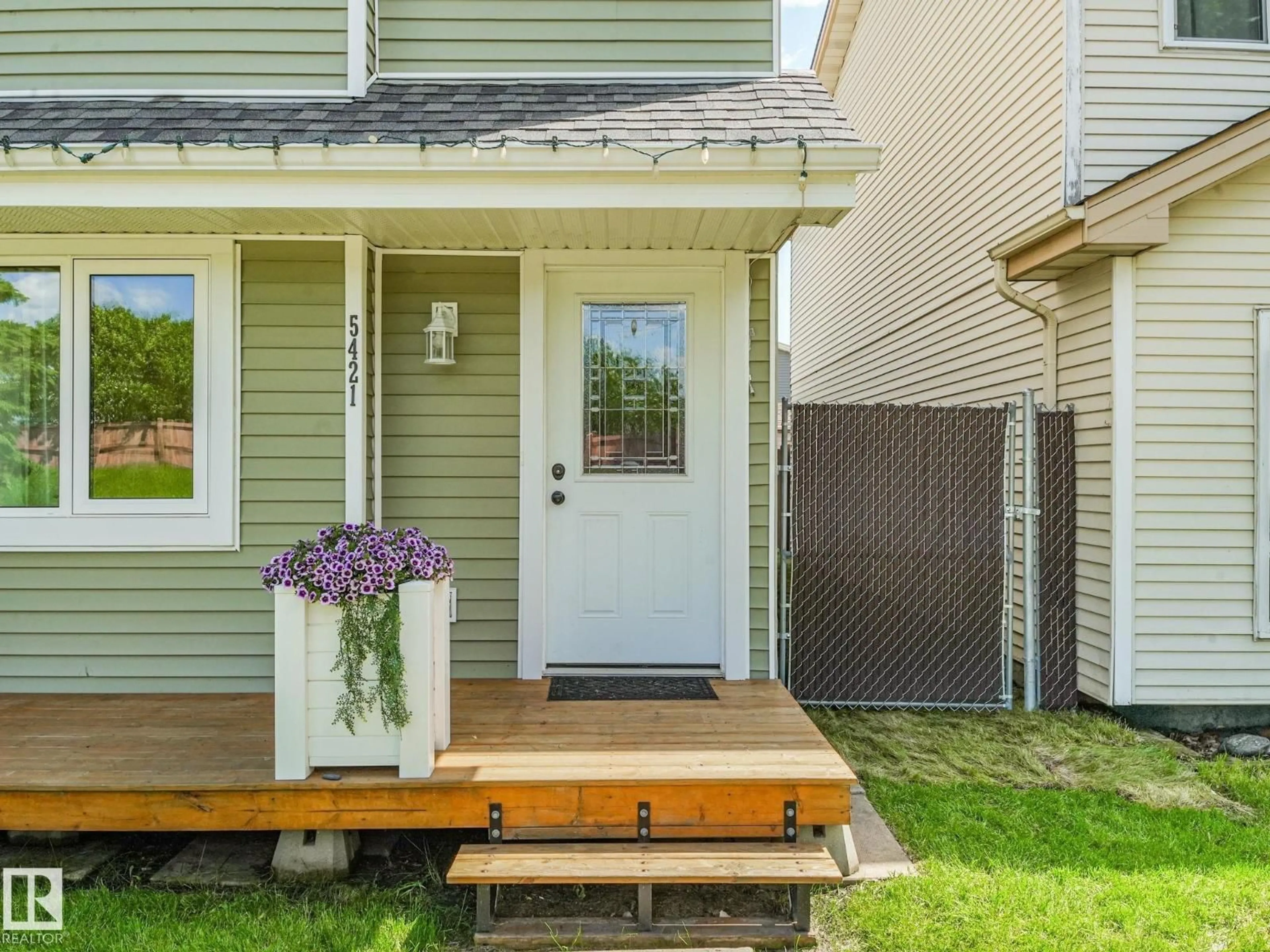 Home with vinyl exterior material, street for 5421 22 AV, Edmonton Alberta T6L4V1
