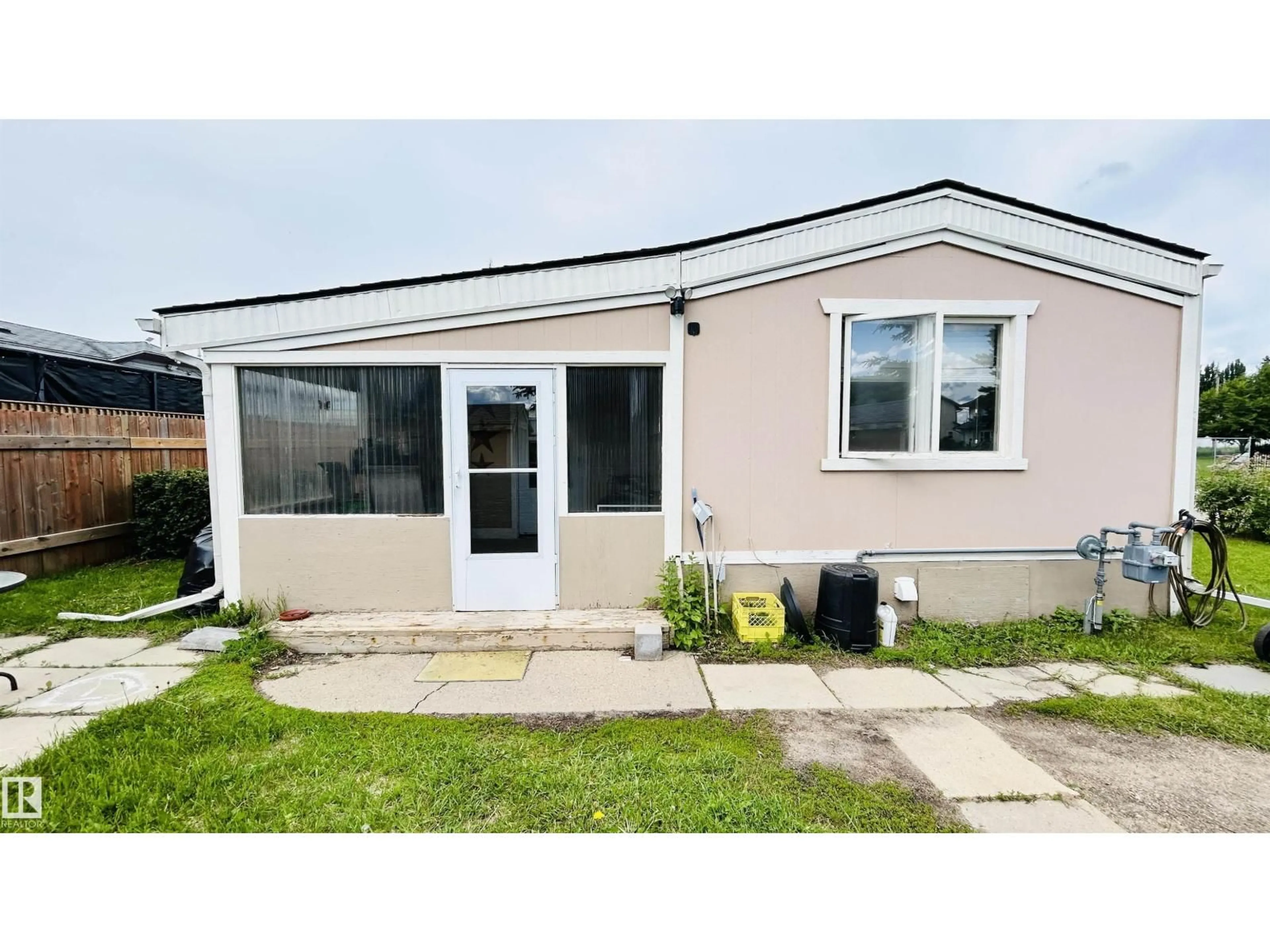Home with vinyl exterior material, street for 4811 43 ST, Bonnyville Town Alberta T9N1G3