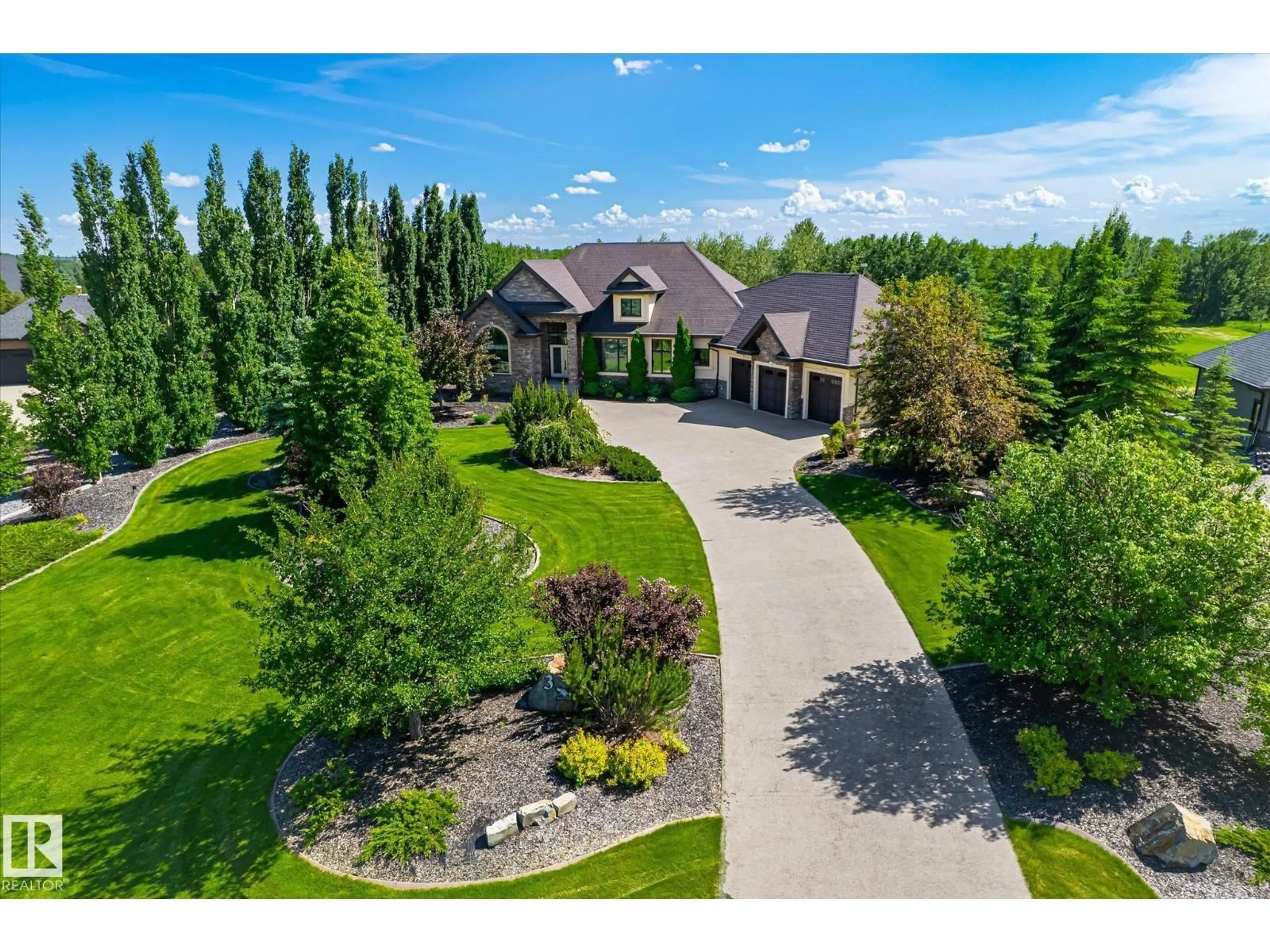 A pic from outside/outdoor area/front of a property/back of a property/a pic from drone, street for #3 - 25515 TWP ROAD 511 A, Rural Parkland County Alberta T7Y1A8