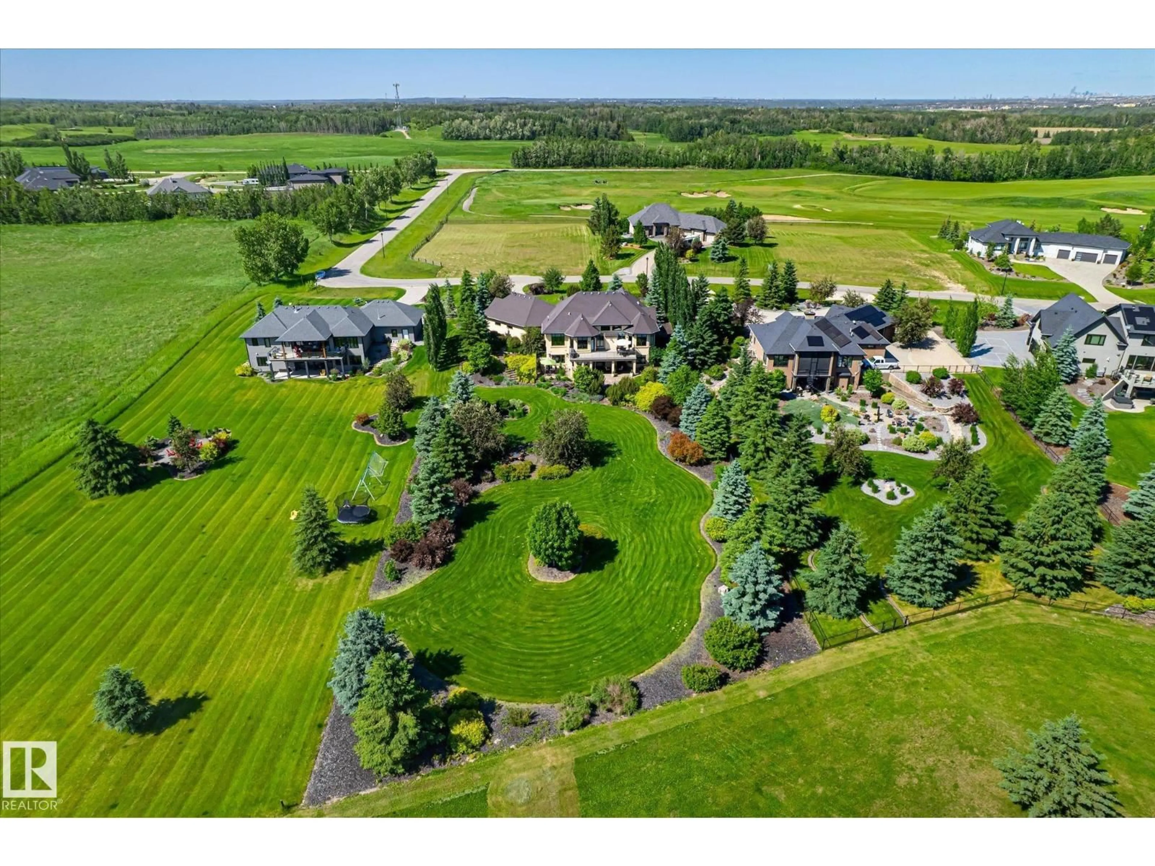 A pic from outside/outdoor area/front of a property/back of a property/a pic from drone, mountain view for #3 - 25515 TWP ROAD 511 A, Rural Parkland County Alberta T7Y1A8
