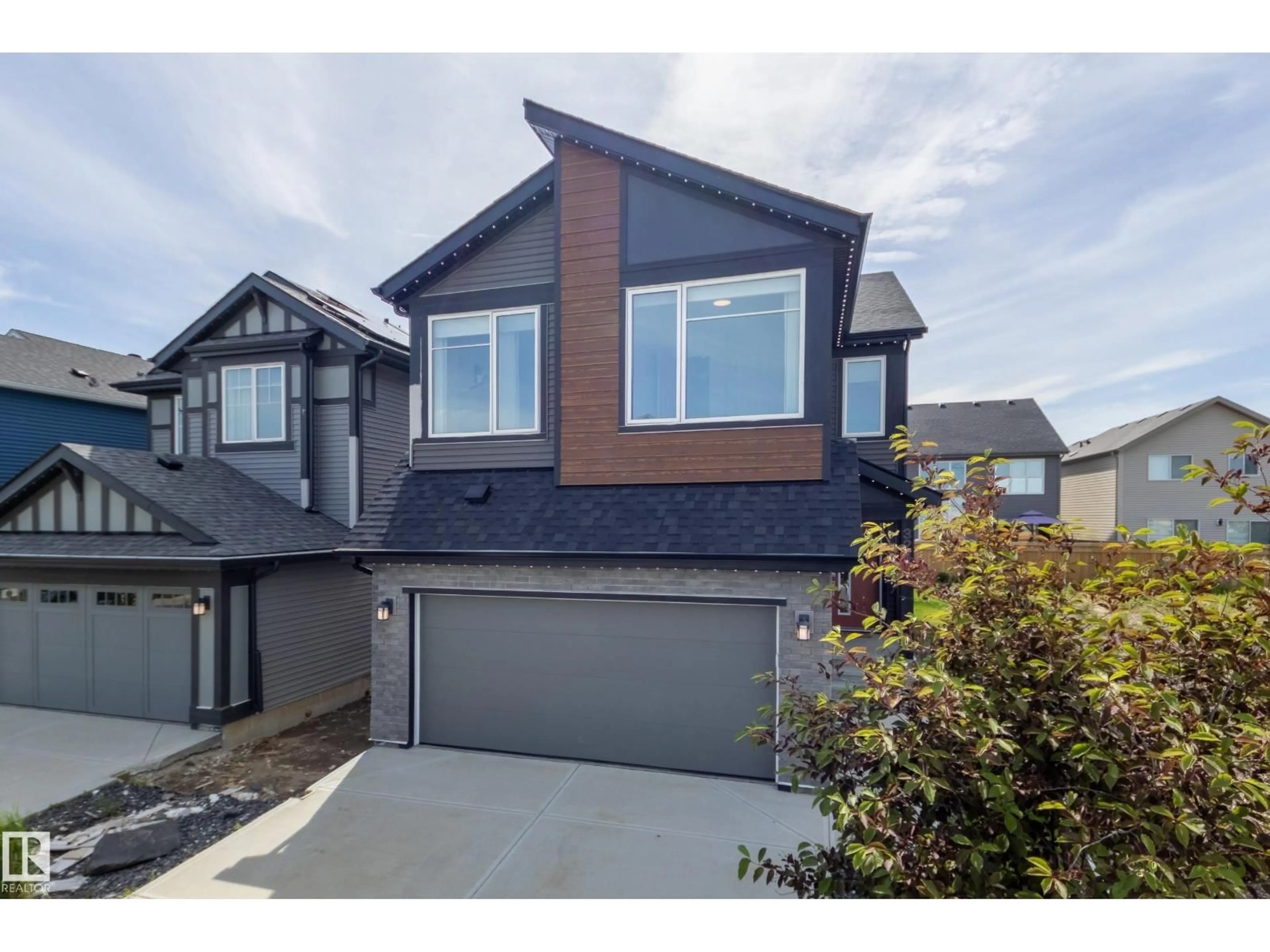 Home with vinyl exterior material, street for 3249 DIXON WAY, Edmonton Alberta T6W5K9