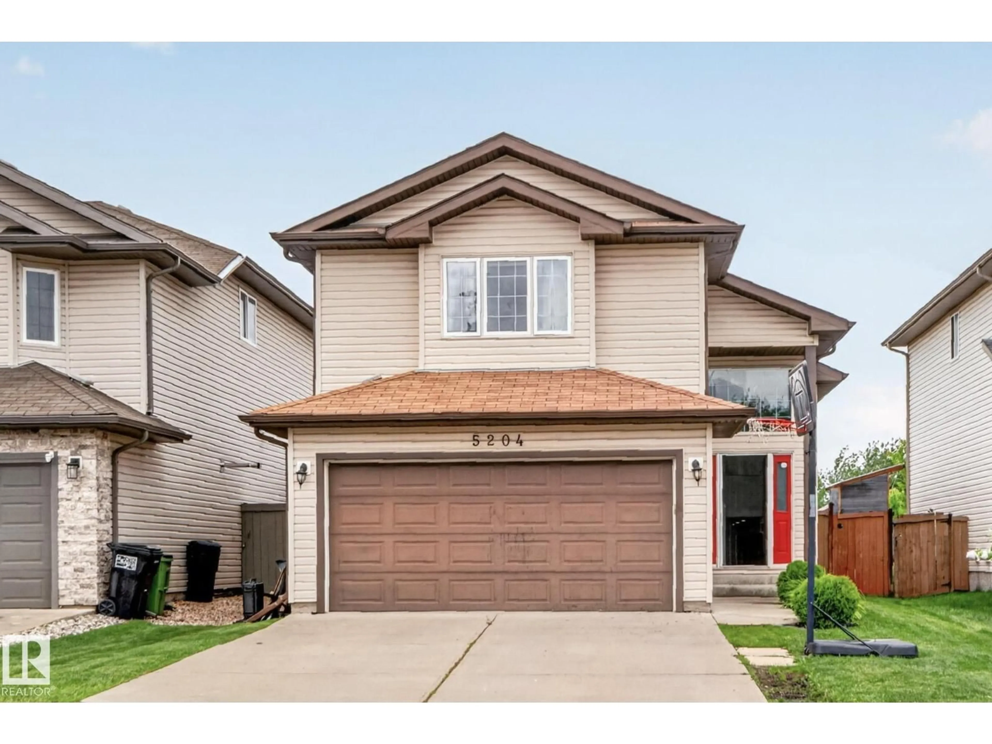 Home with vinyl exterior material, street for 5204 159 AV, Edmonton Alberta T5Y0M4