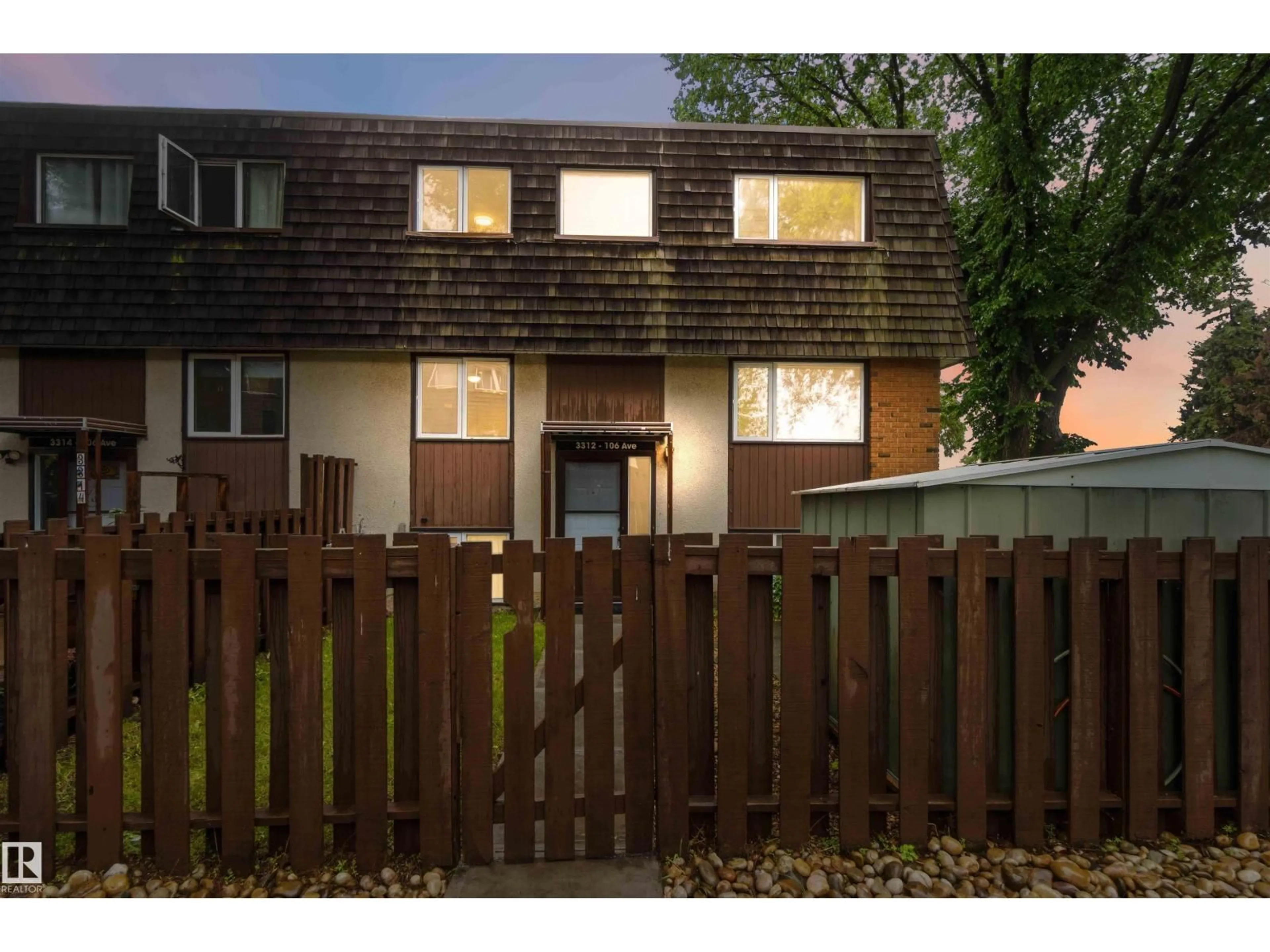 A pic from outside/outdoor area/front of a property/back of a property/a pic from drone, street for 3312 106 AV, Edmonton Alberta T5W0C2