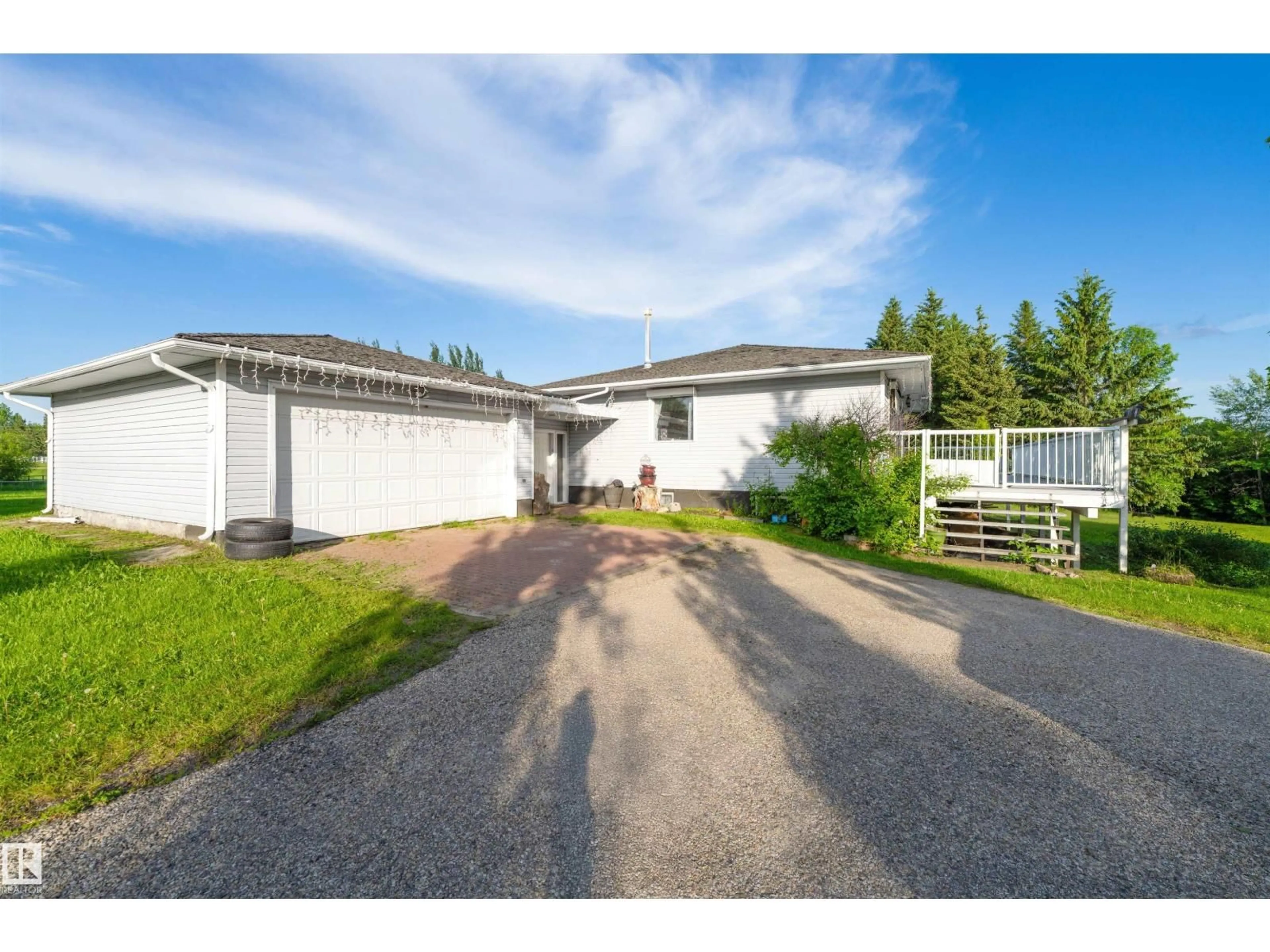 A pic from outside/outdoor area/front of a property/back of a property/a pic from drone, street for 73 21252 TWP ROAD 540, Rural Strathcona County Alberta T8G2A2