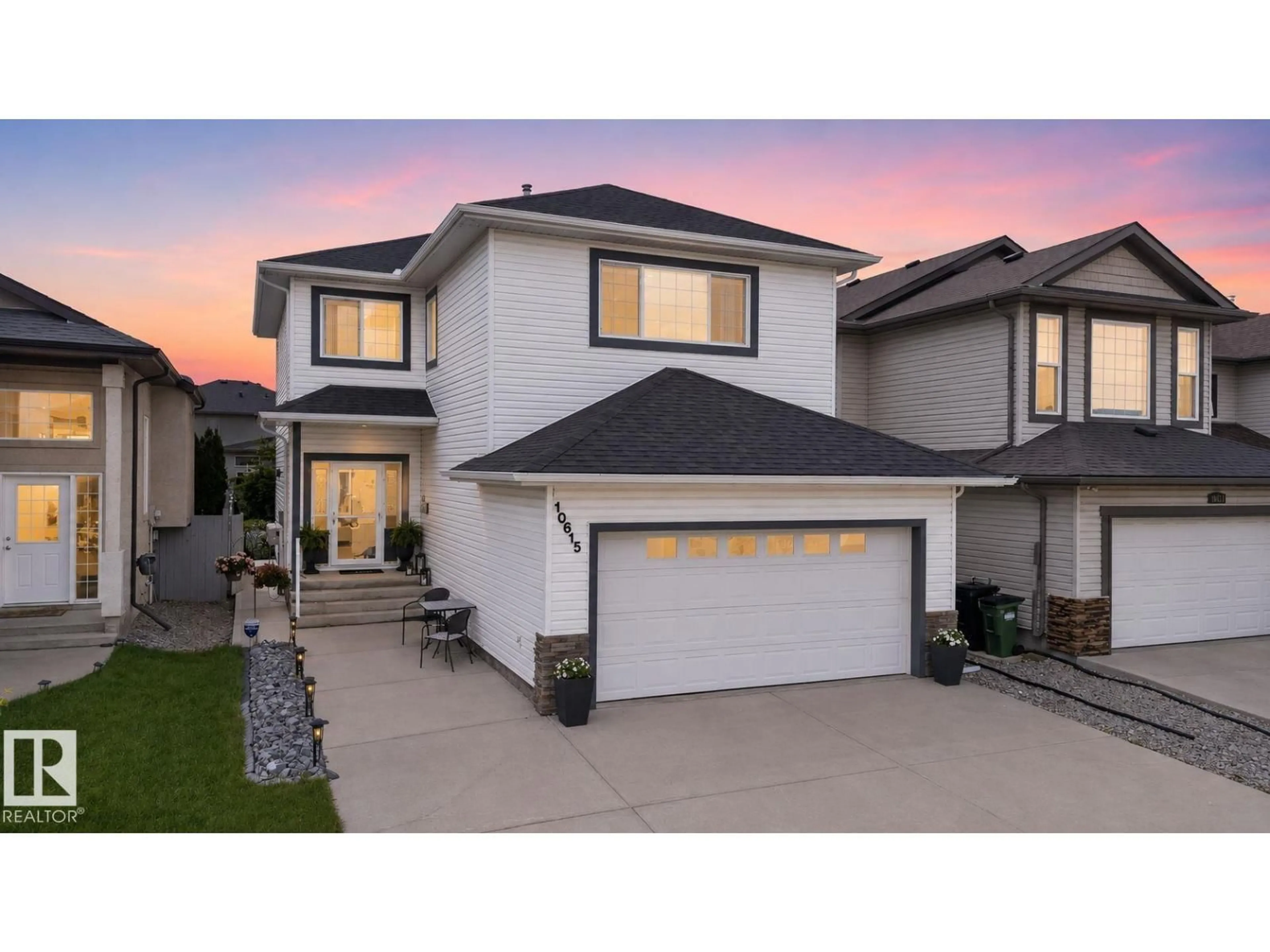 Home with vinyl exterior material, street for 10615 181 AV, Edmonton Alberta T5X6J7