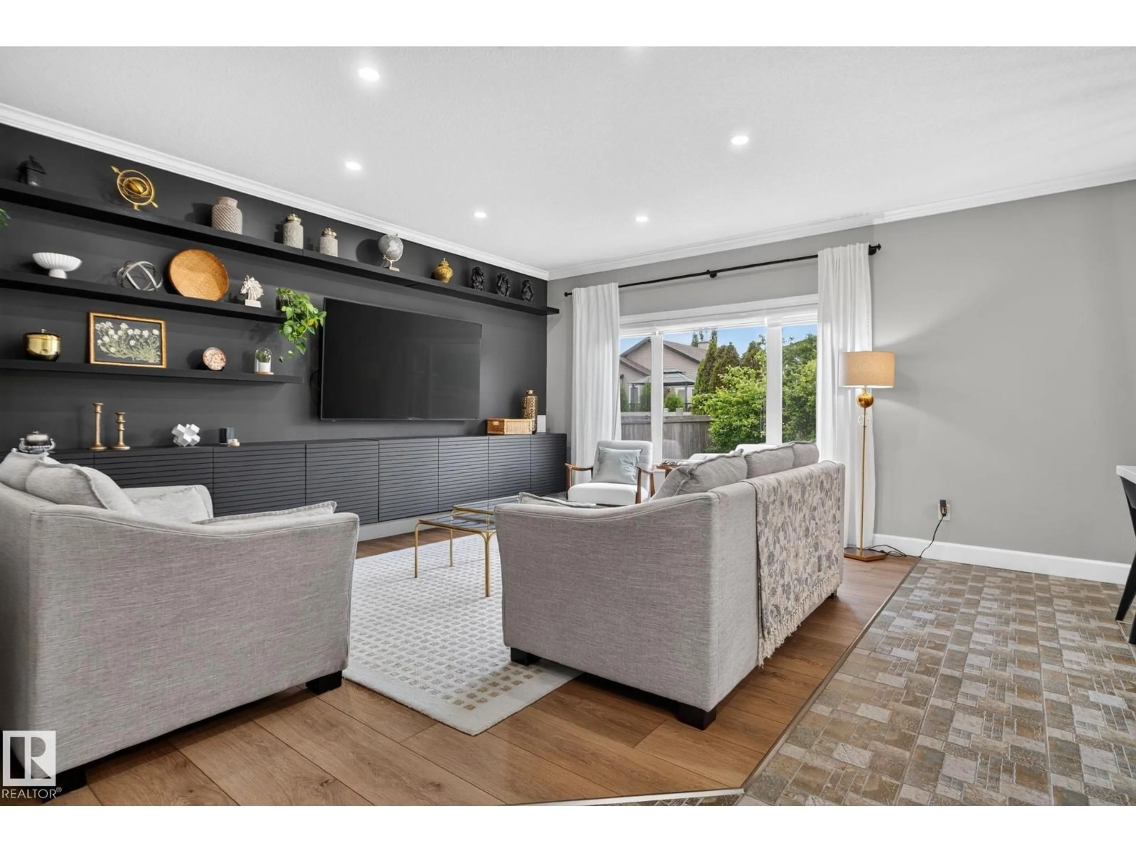 Living room with furniture, unknown for 10615 181 AV, Edmonton Alberta T5X6J7