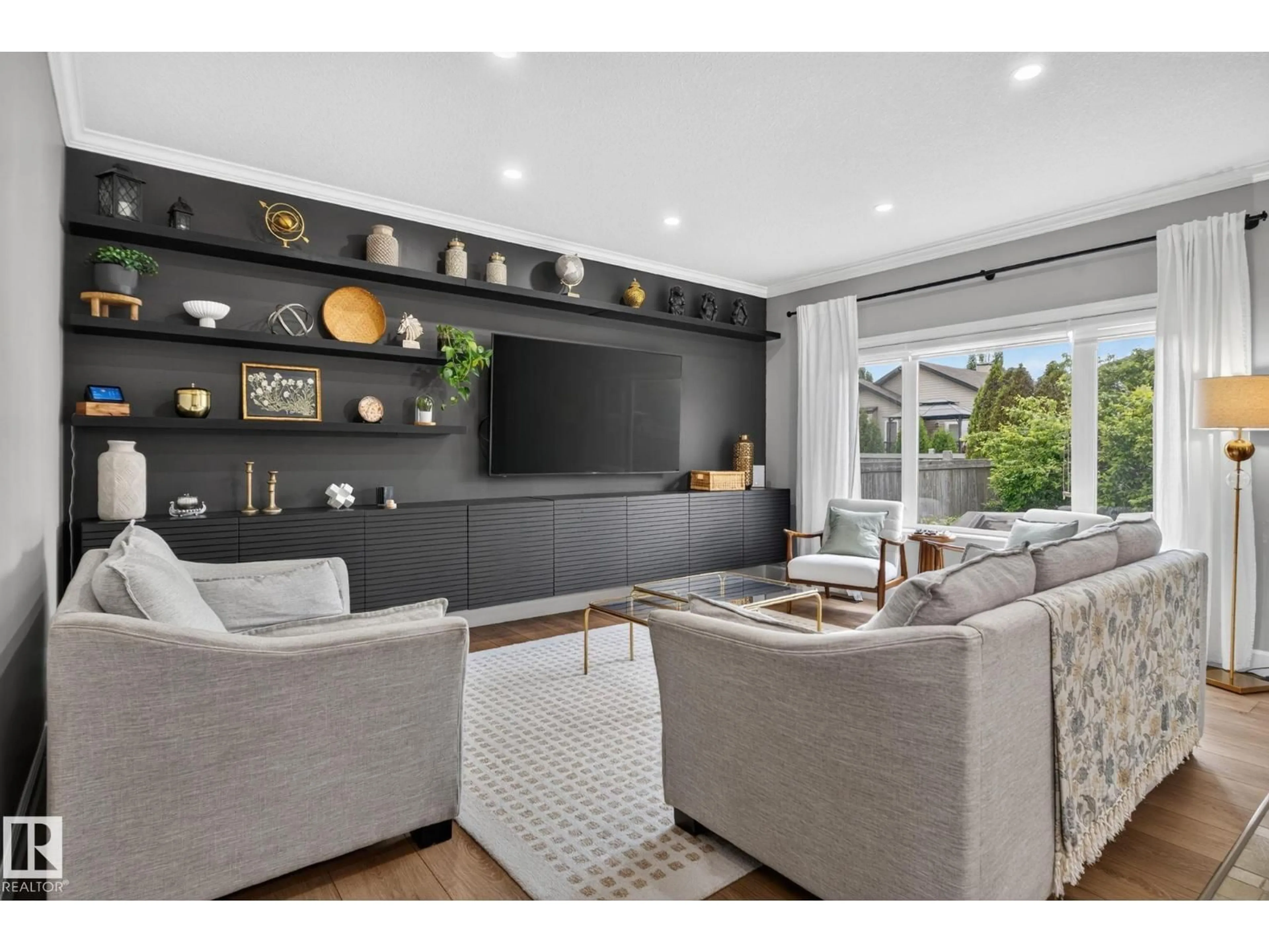 Living room with furniture, unknown for 10615 181 AV, Edmonton Alberta T5X6J7
