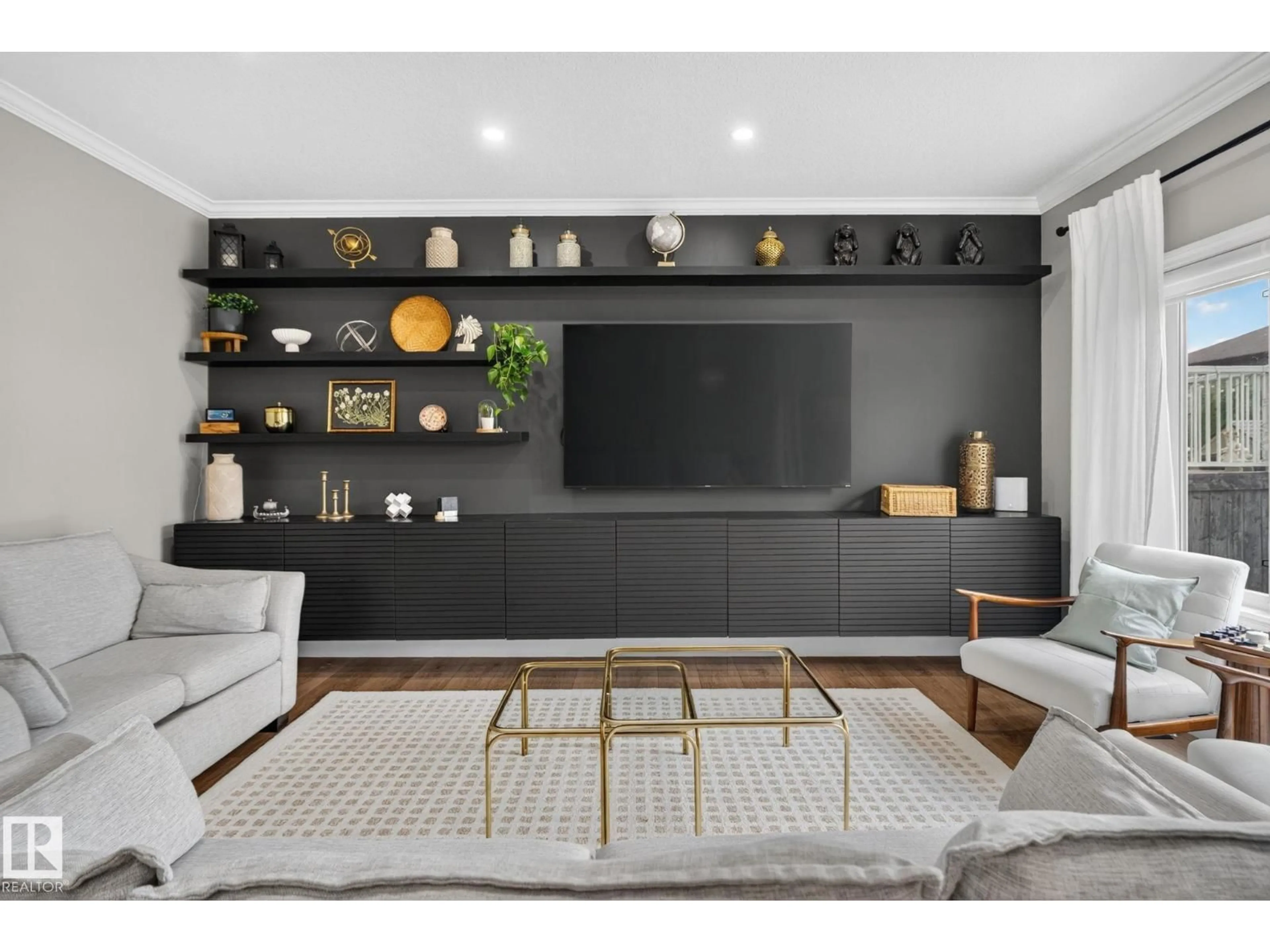 Living room with furniture, unknown for 10615 181 AV, Edmonton Alberta T5X6J7