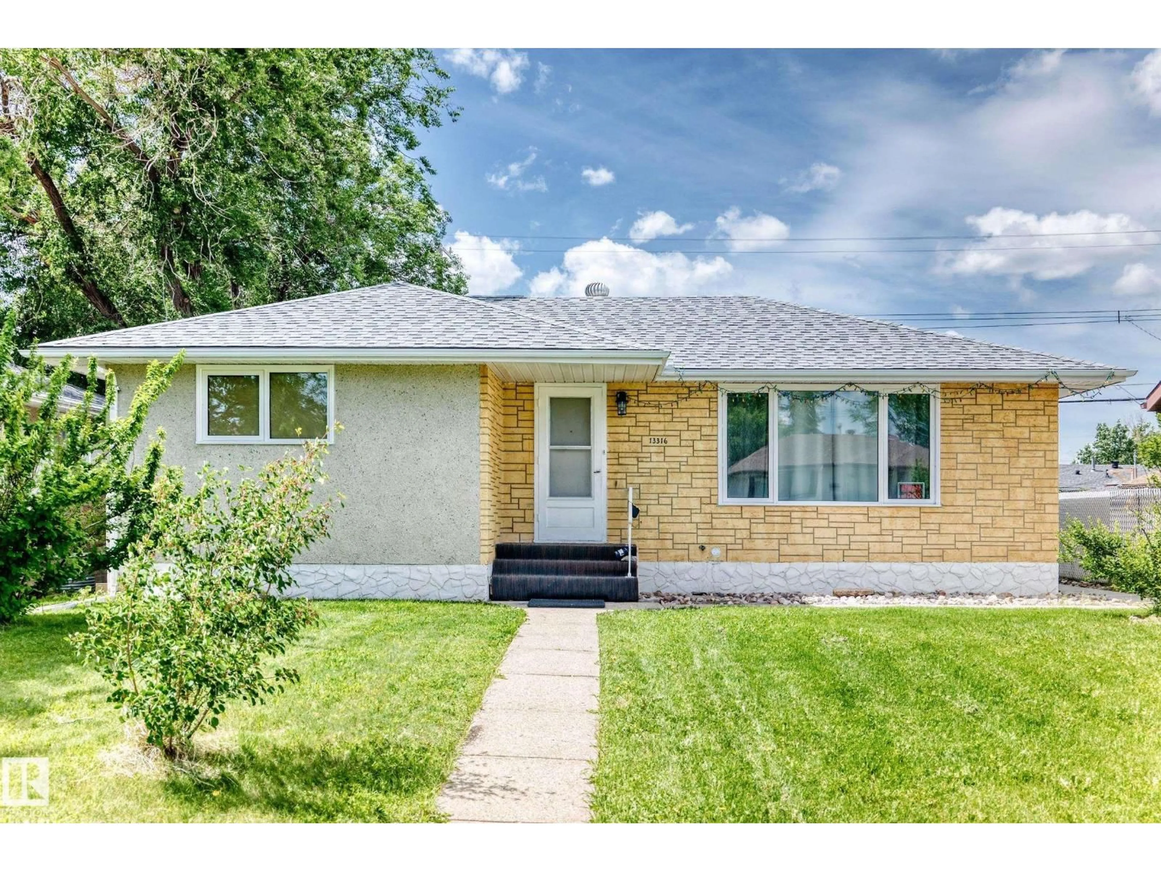Home with vinyl exterior material, street for NW - 13316 122 ST, Edmonton Alberta T5L0G3