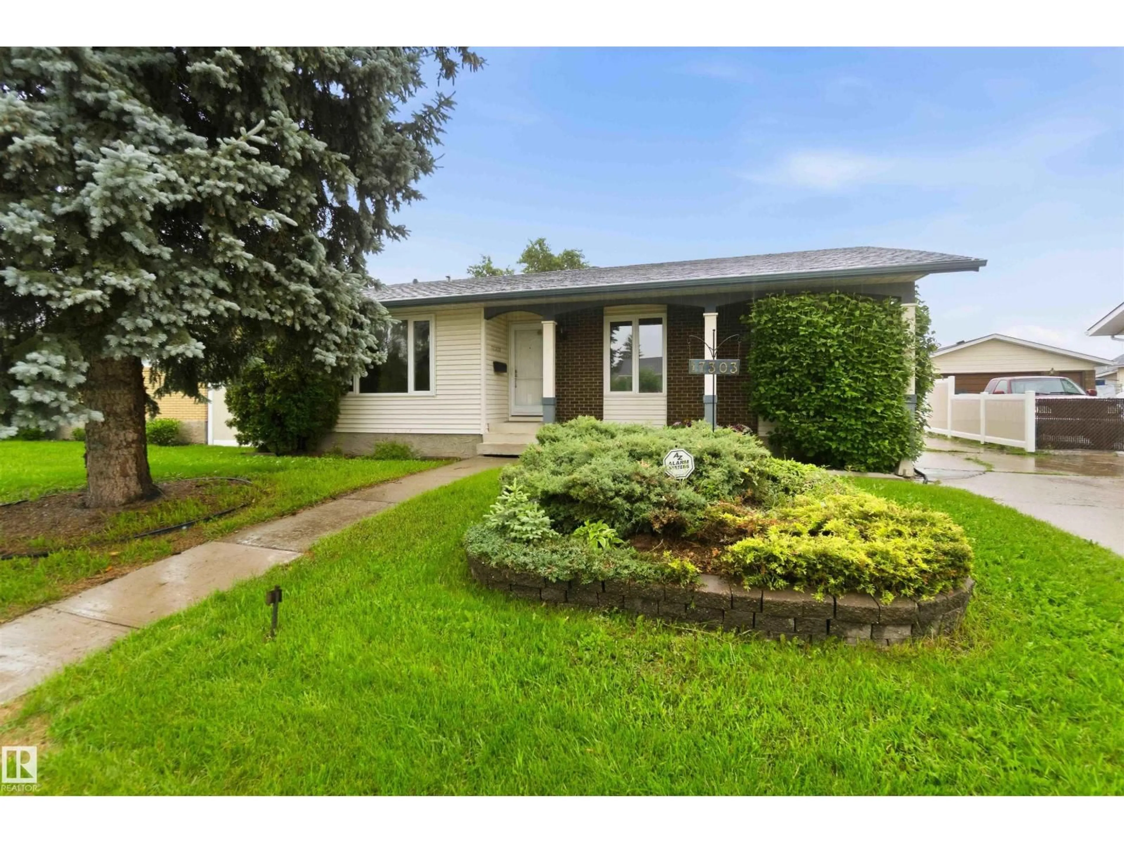 Home with vinyl exterior material, street for NW - 17303 107 ST, Edmonton Alberta T5H3H5