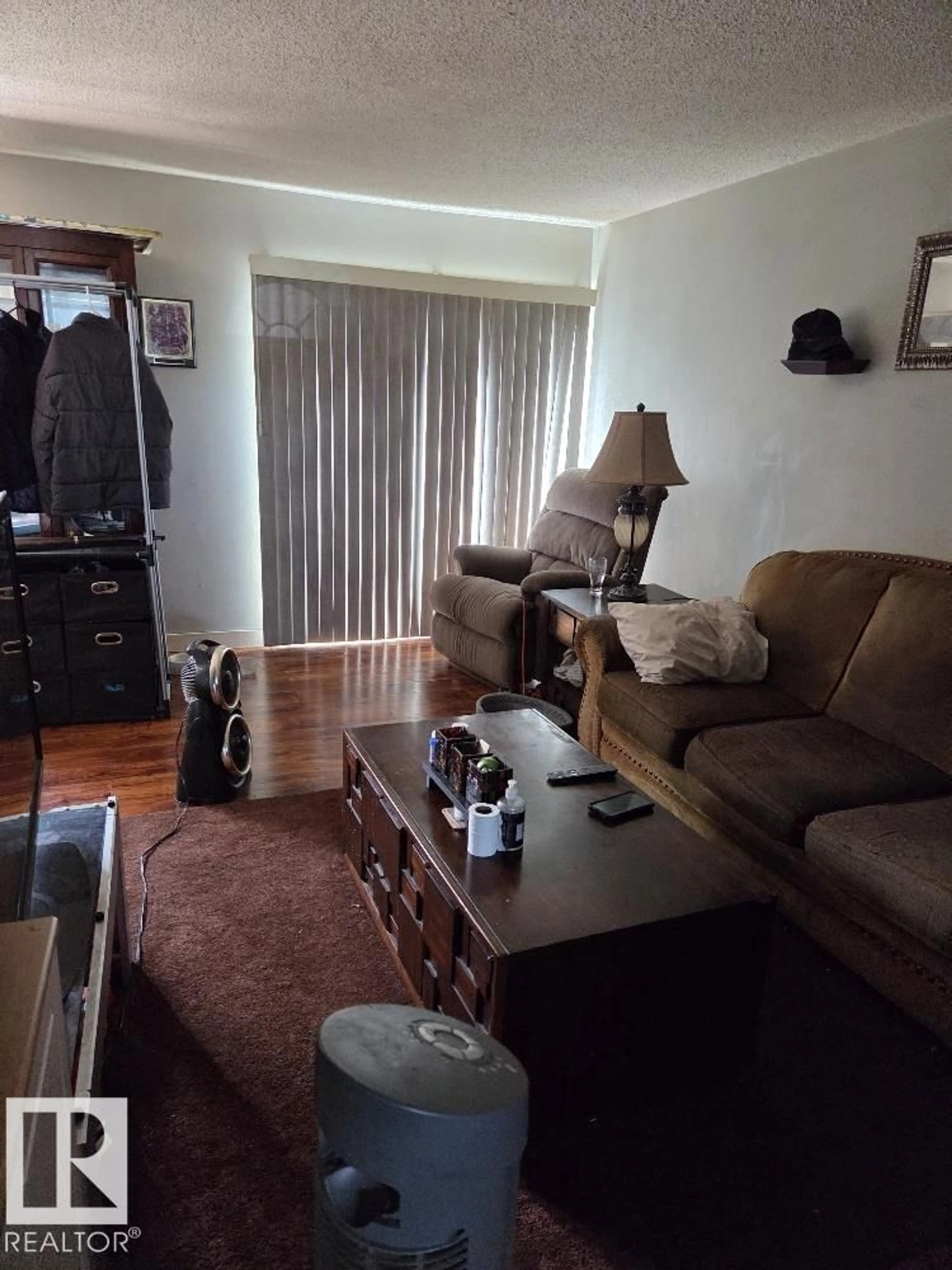 Living room with furniture, wood/laminate floor for 125 CORNELL CT, Edmonton Alberta T5C3C3