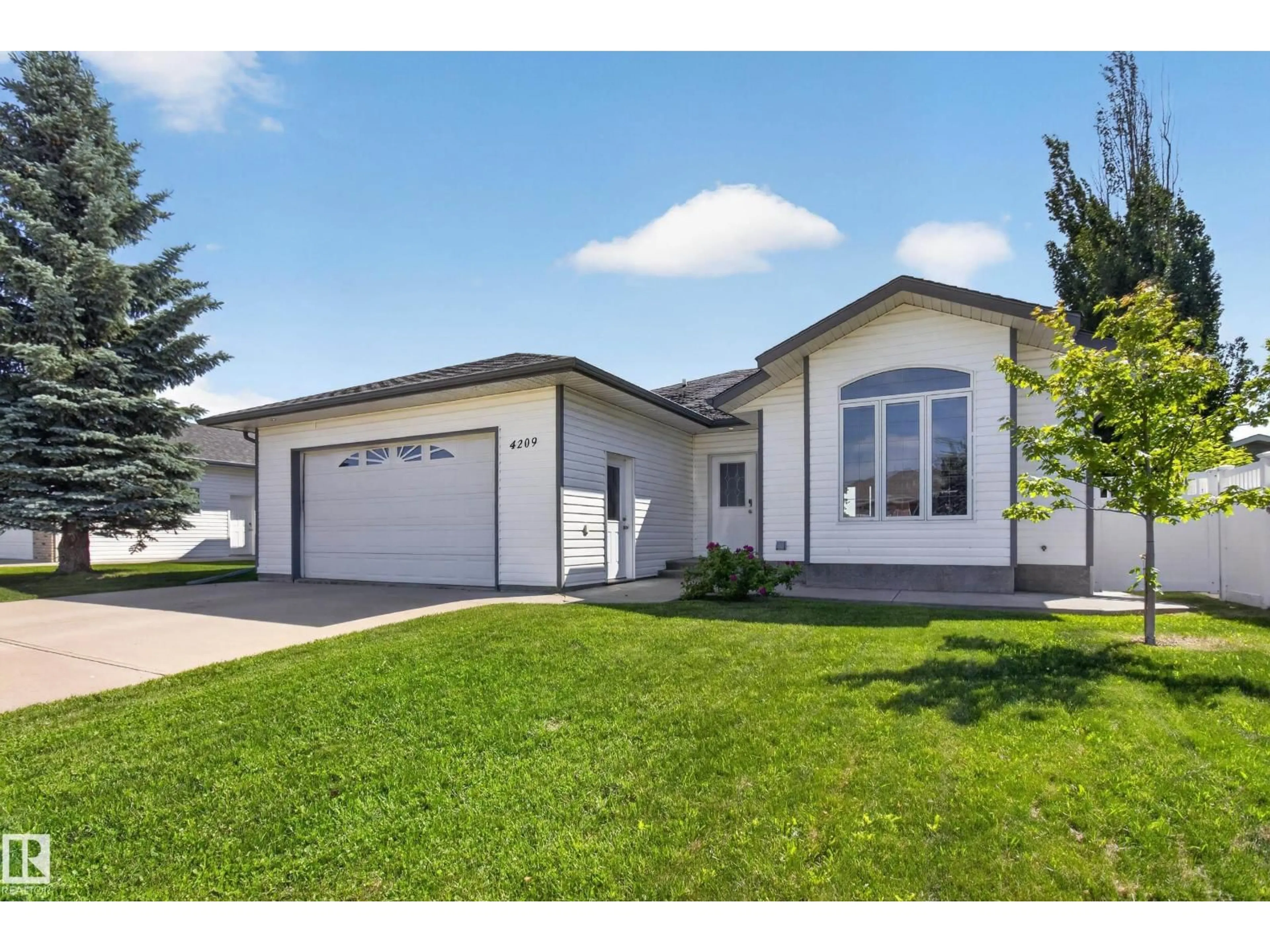 Home with vinyl exterior material, street for 4209 46 ST, Vegreville Alberta T9C1X7