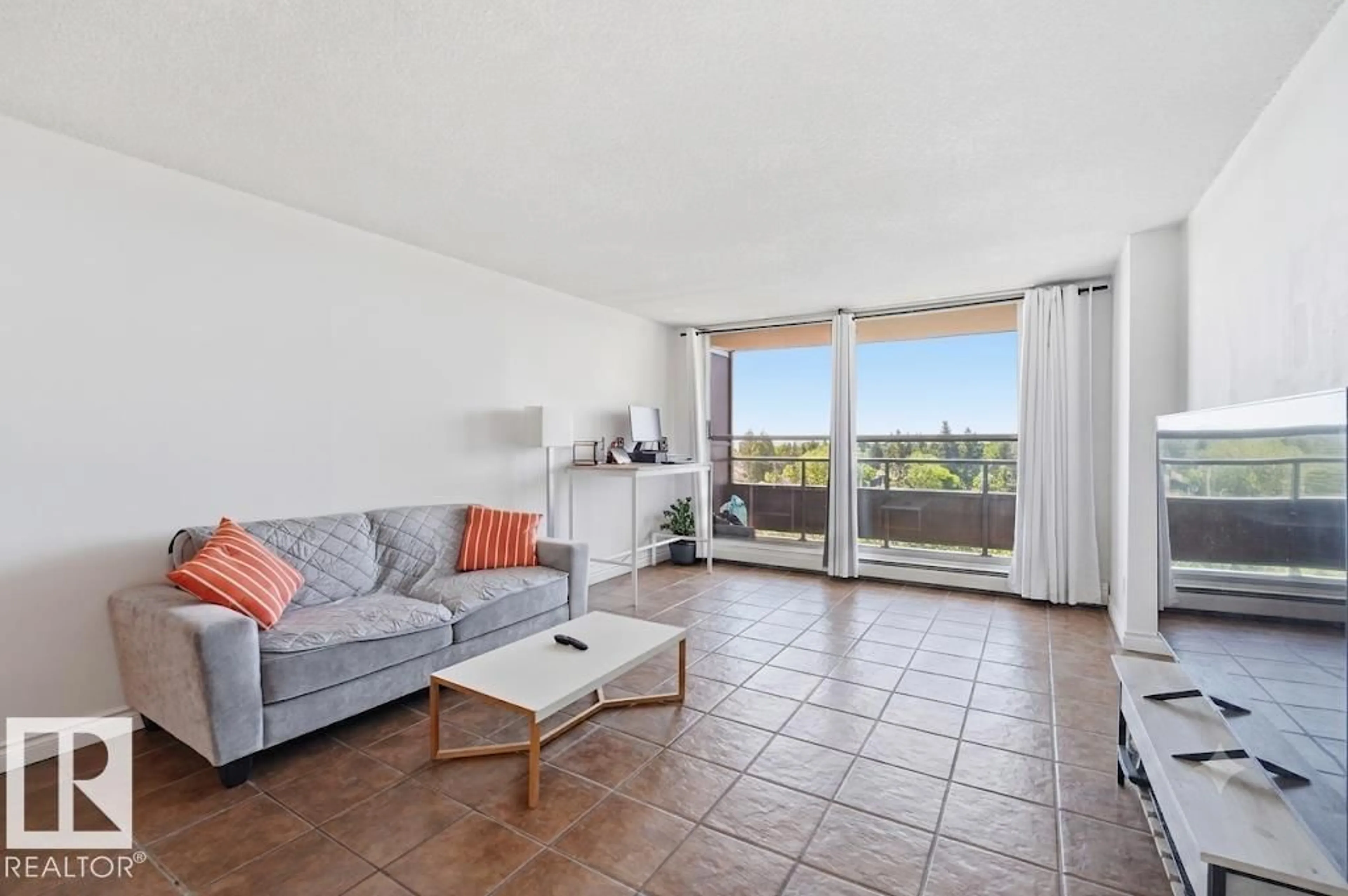 Living room with furniture, unknown for 13910 - 612 STONY PLAIN RD, Edmonton Alberta T5N3R2