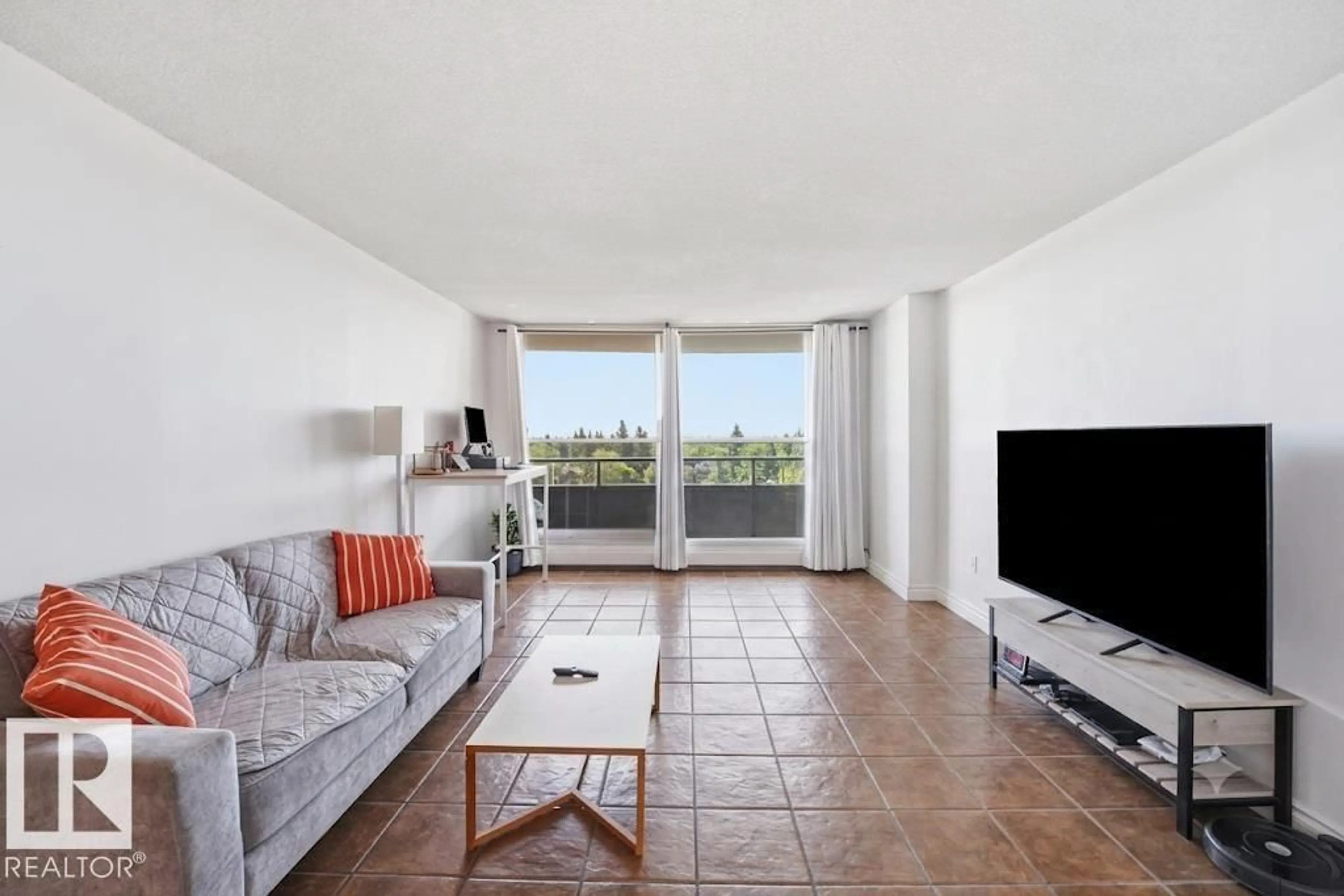 Living room with furniture, unknown for 13910 - 612 STONY PLAIN RD, Edmonton Alberta T5N3R2