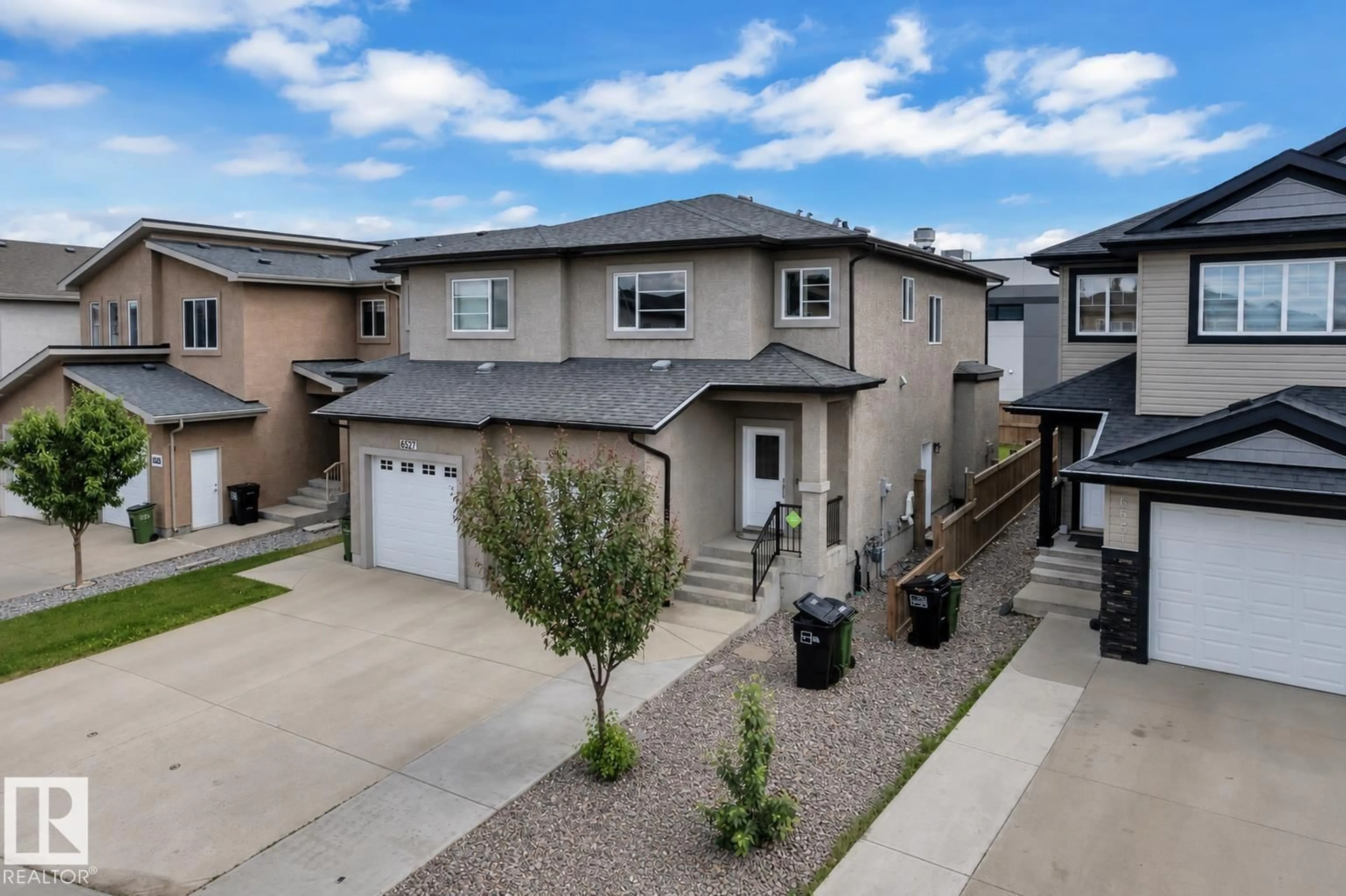 A pic from outside/outdoor area/front of a property/back of a property/a pic from drone, street for 6529 172 AV, Edmonton Alberta T5Y3R1
