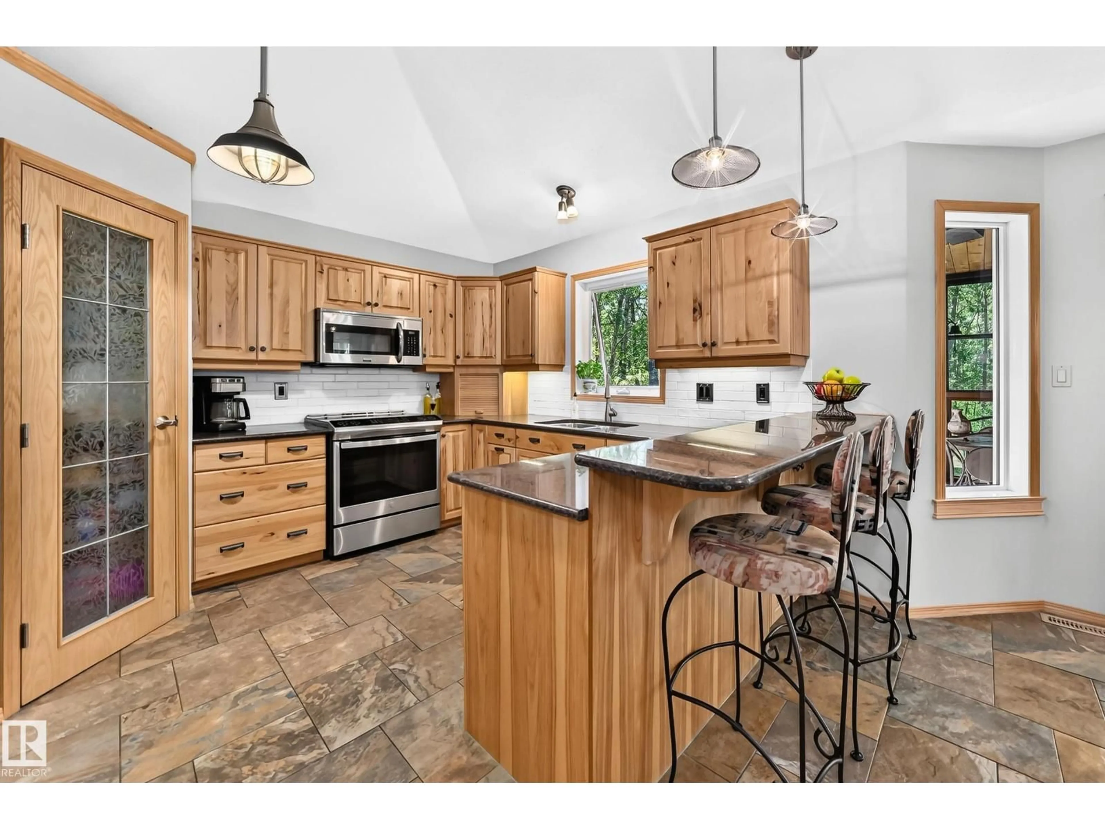 Open concept kitchen, ceramic/tile floor for 133 52465 RGE ROAD 213, Rural Strathcona County Alberta T8G2E8