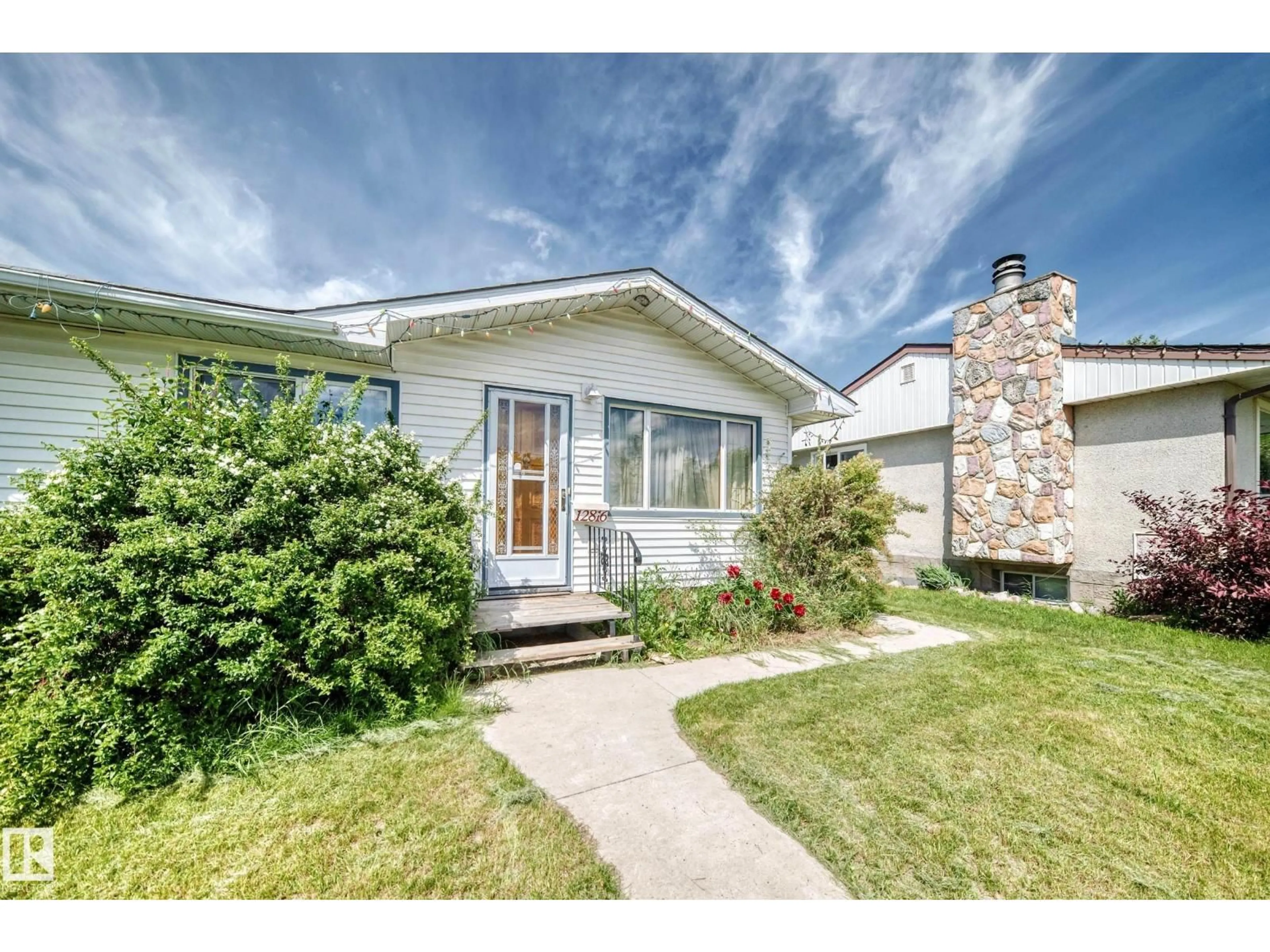 Home with vinyl exterior material, street for NW - 12816 77 ST, Edmonton Alberta T5C1C6
