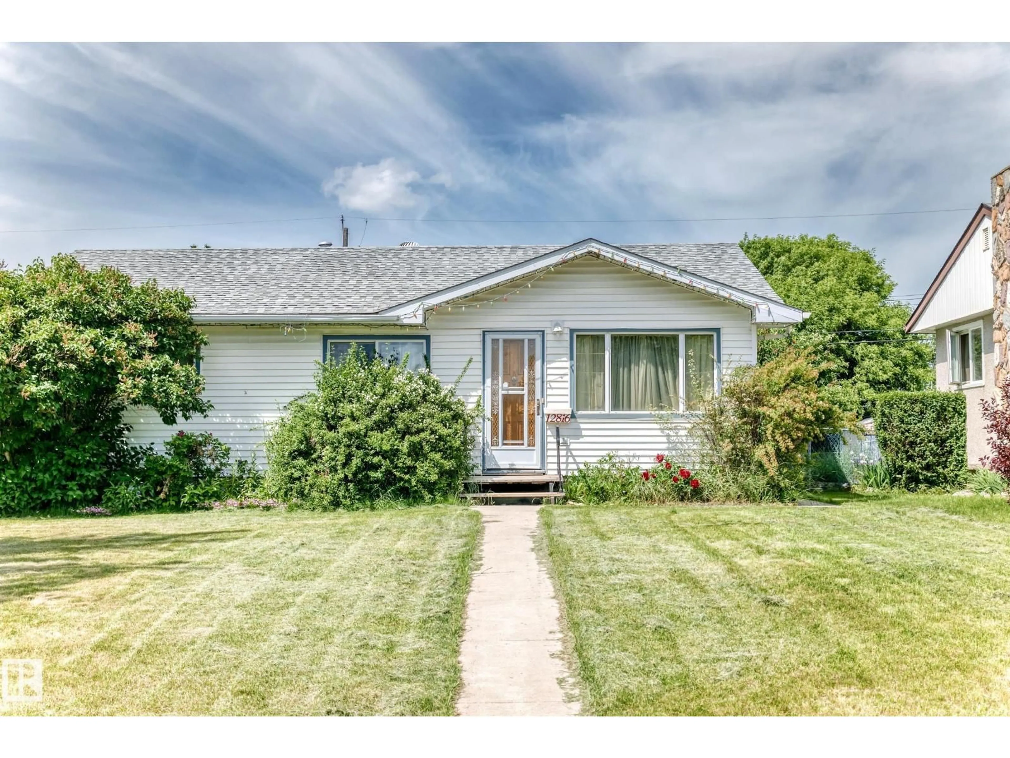 Home with vinyl exterior material, street for NW - 12816 77 ST, Edmonton Alberta T5C1C6