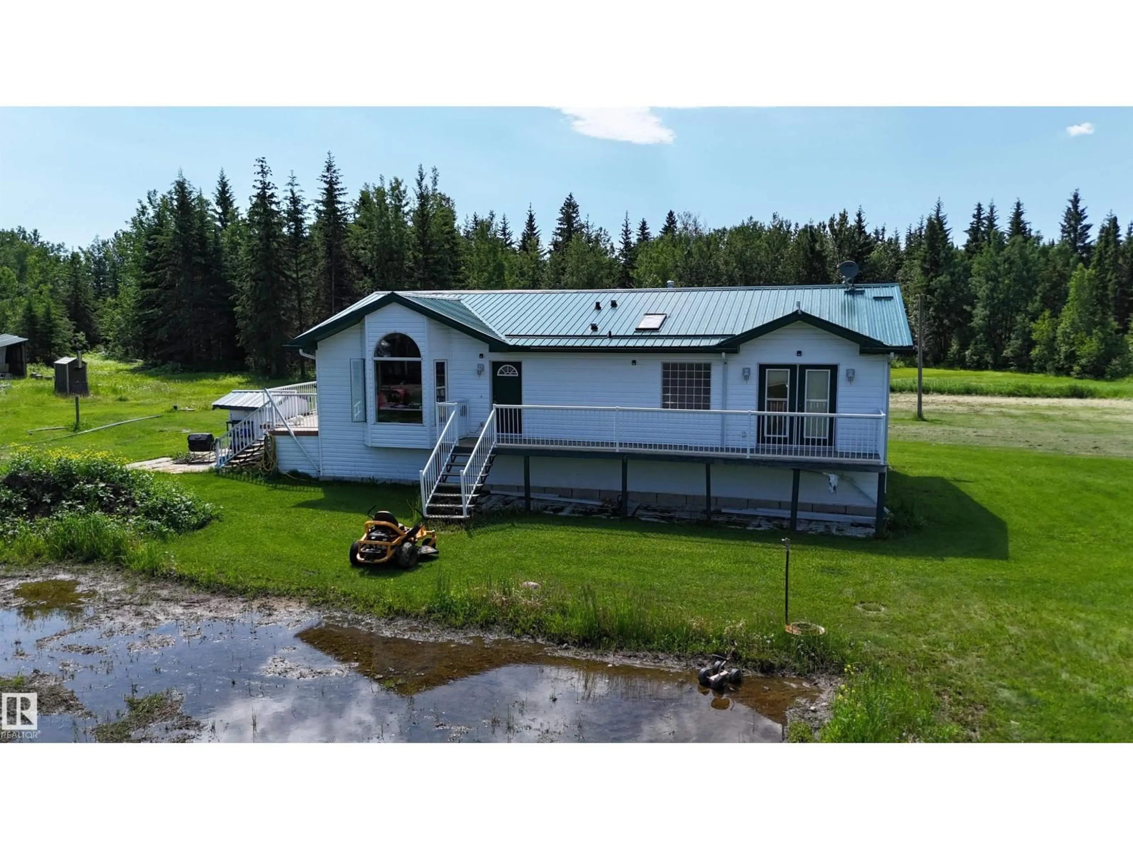 A pic from outside/outdoor area/front of a property/back of a property/a pic from drone, water/lake/river/ocean view for 674036 RGE ROAD 193, Rural Athabasca County Alberta T0A0M0