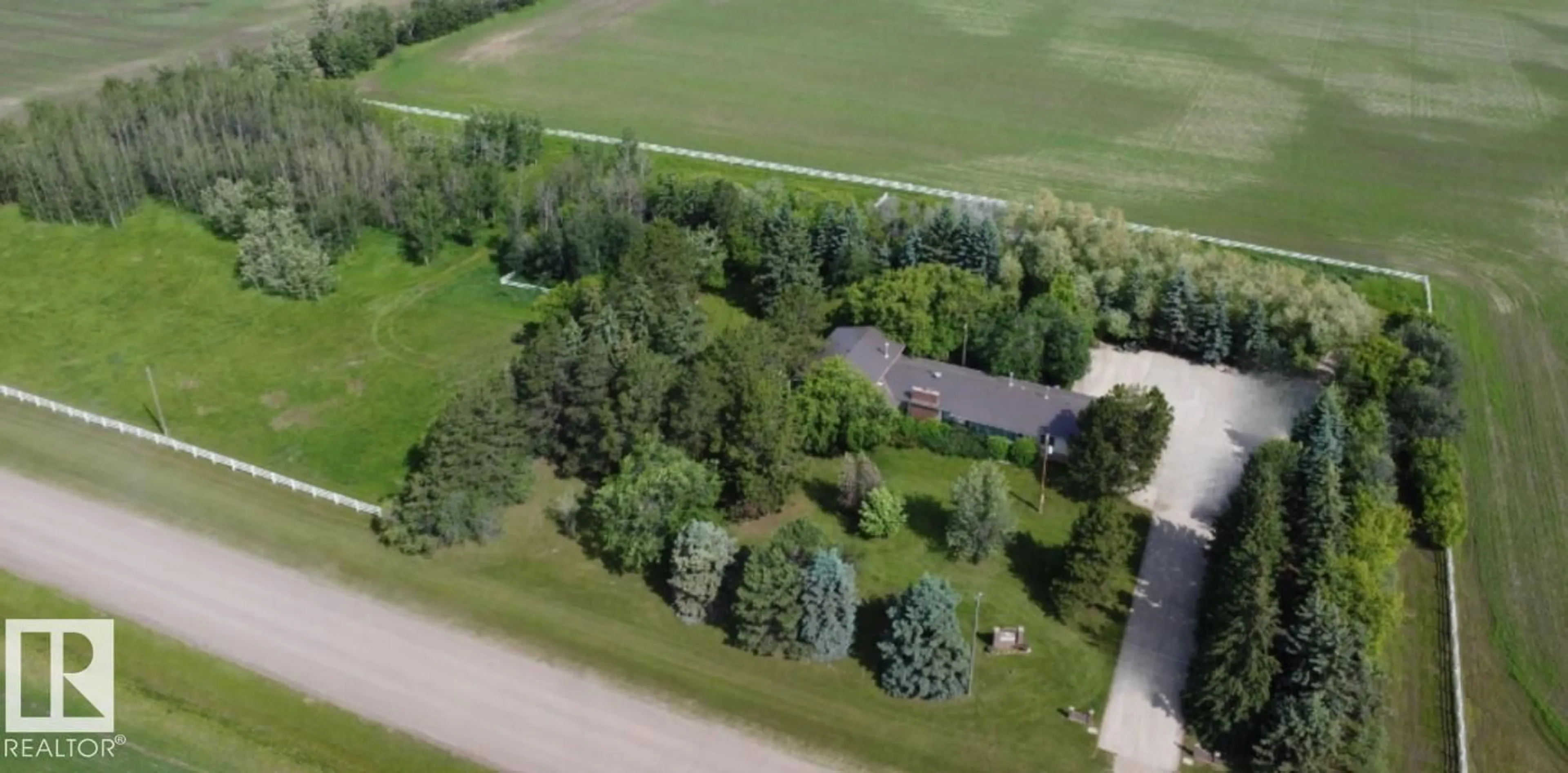 A pic from outside/outdoor area/front of a property/back of a property/a pic from drone, unknown for 26530 TWP RD 590, Rural Westlock County Alberta T0G1W0