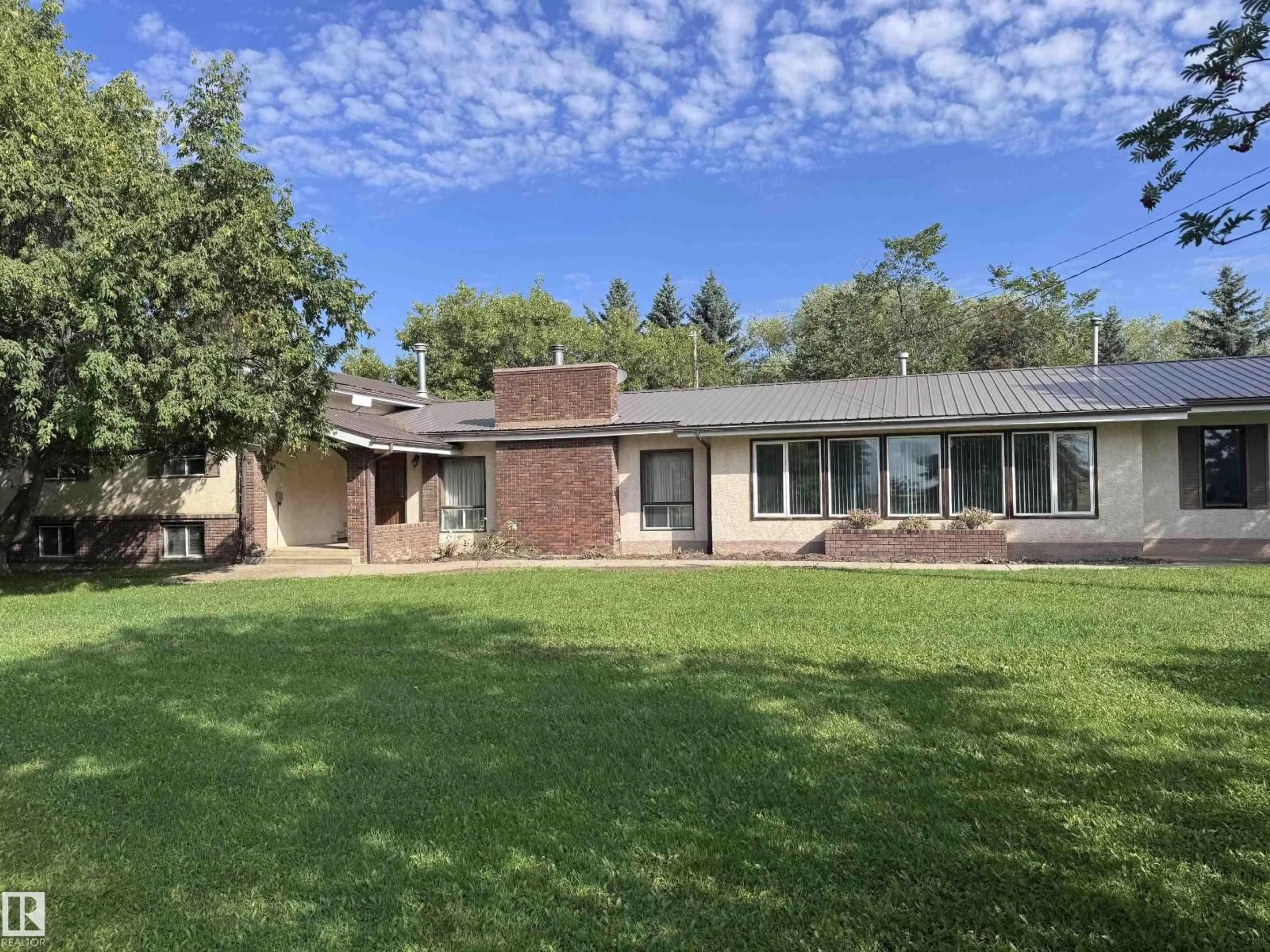 A pic from outside/outdoor area/front of a property/back of a property/a pic from drone, street for 26530 TWP RD 590, Rural Westlock County Alberta T0G1W0